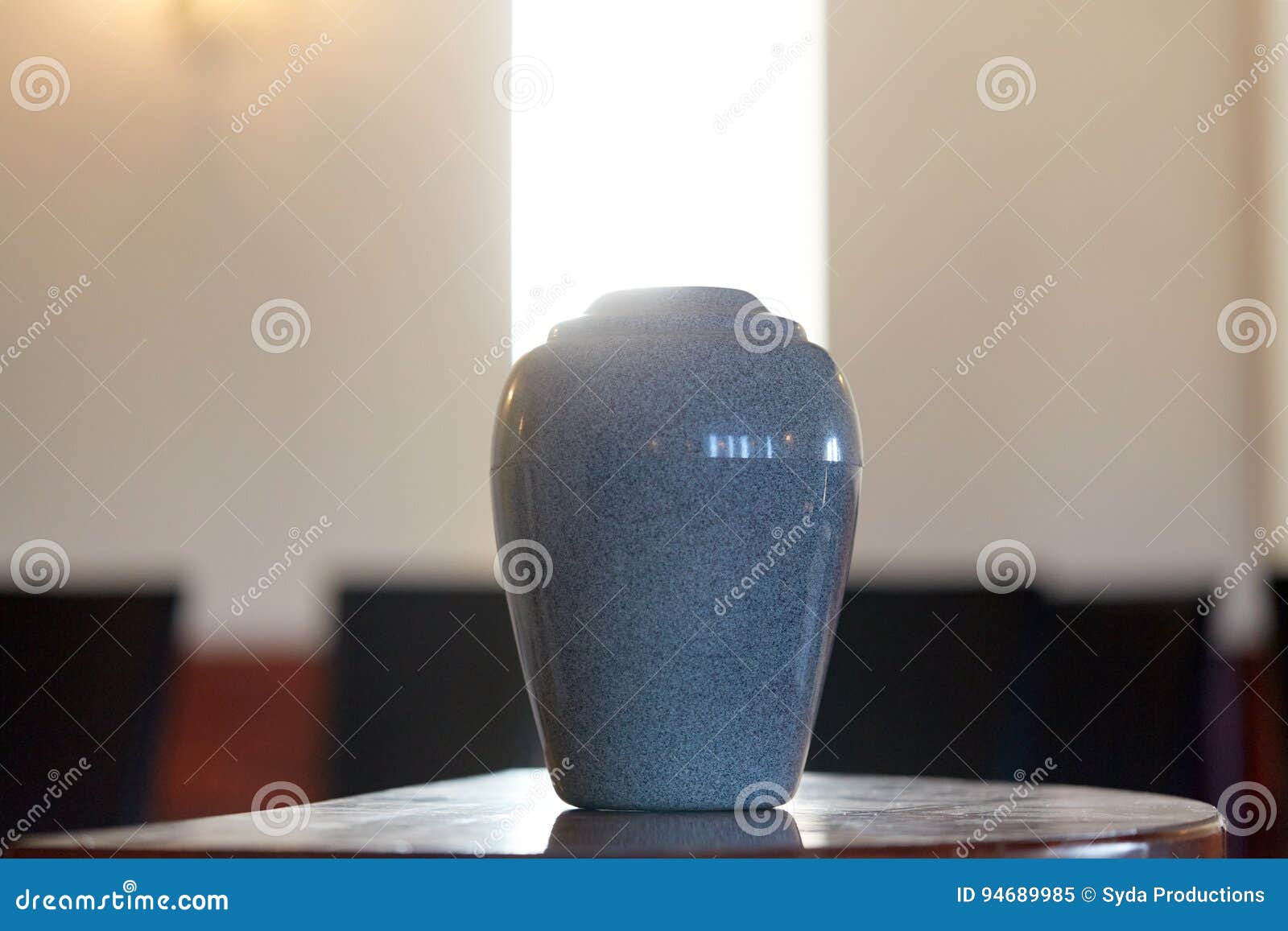 cremation urn on table in church