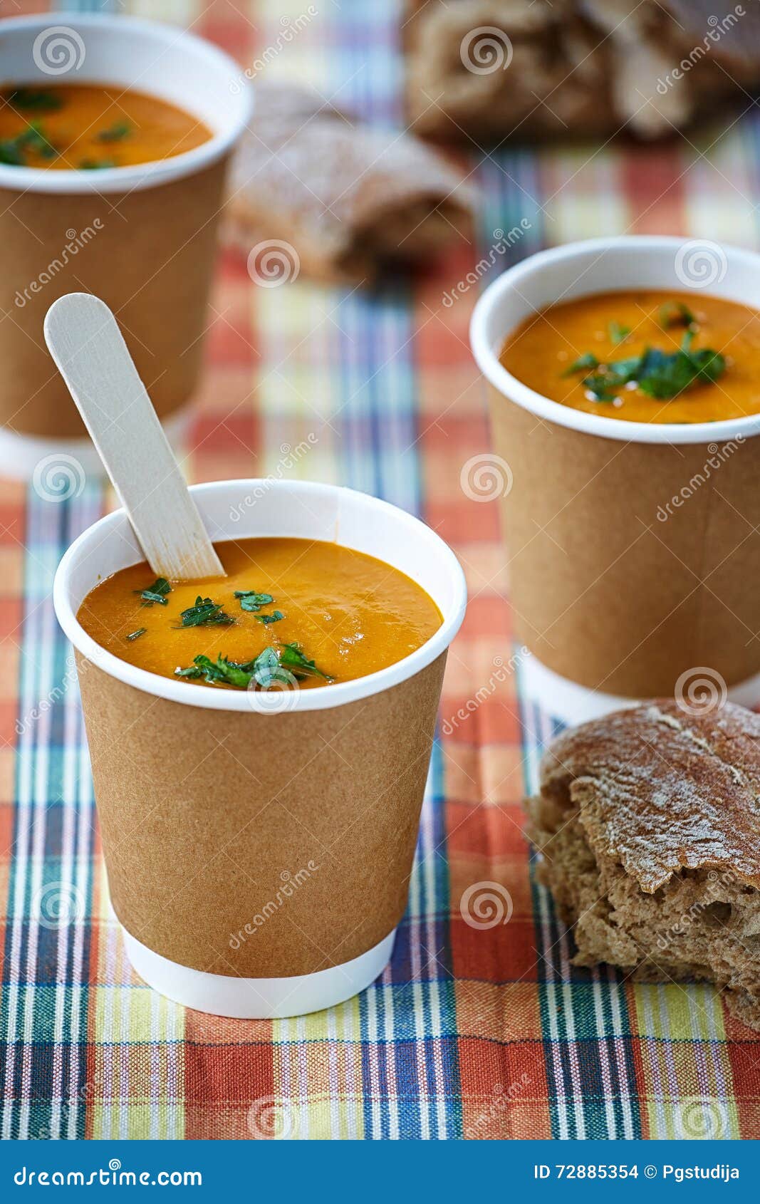 Creme Soup in Paper Cups in the Checked Background Stock Photo Image