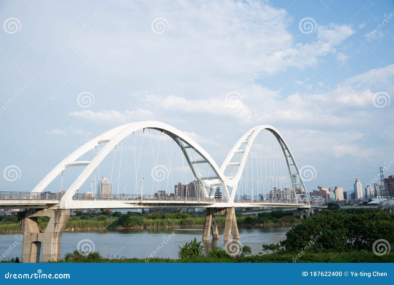 crescent bridge with blue sky