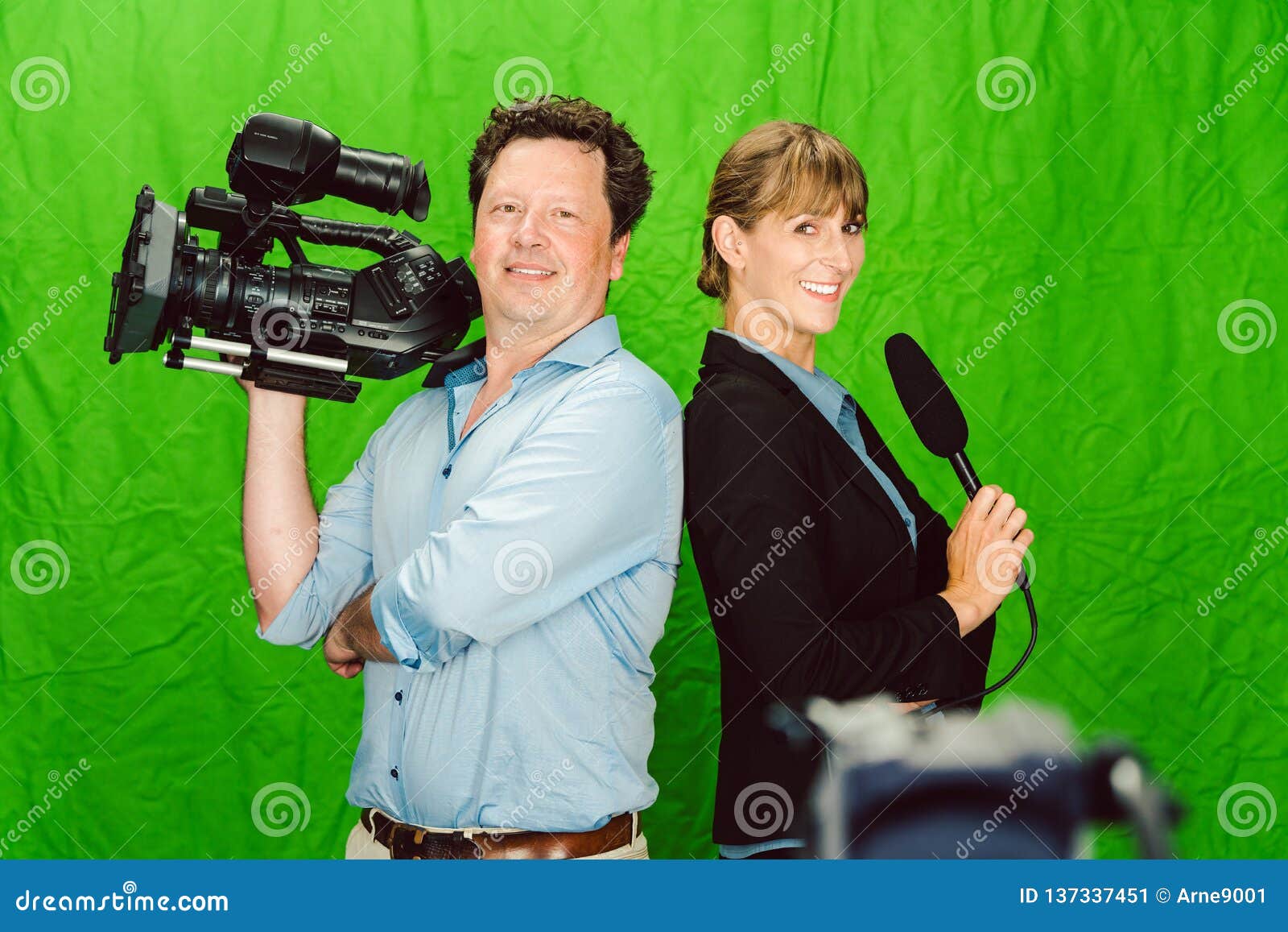 Crew of Reporter and Cameraman Posing in the Studio Stock Image Image of people, professional