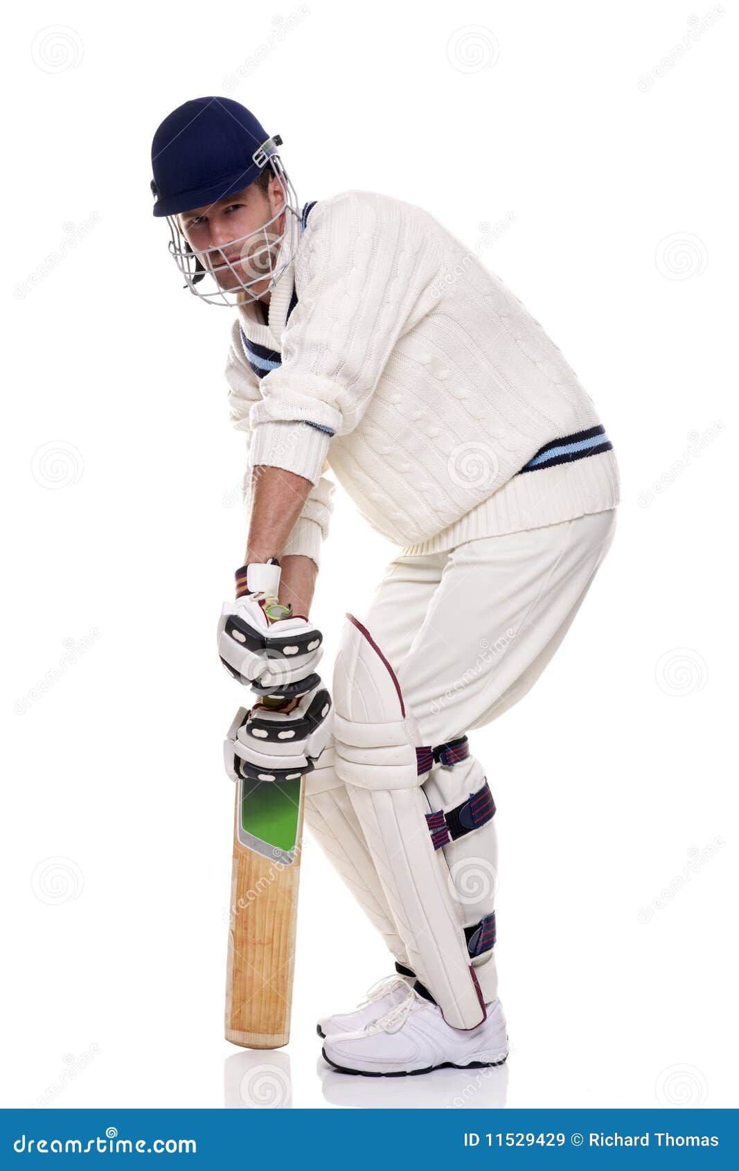 Portrait cricket player holding bat Cut Out Stock Images & Pictures - Alamy