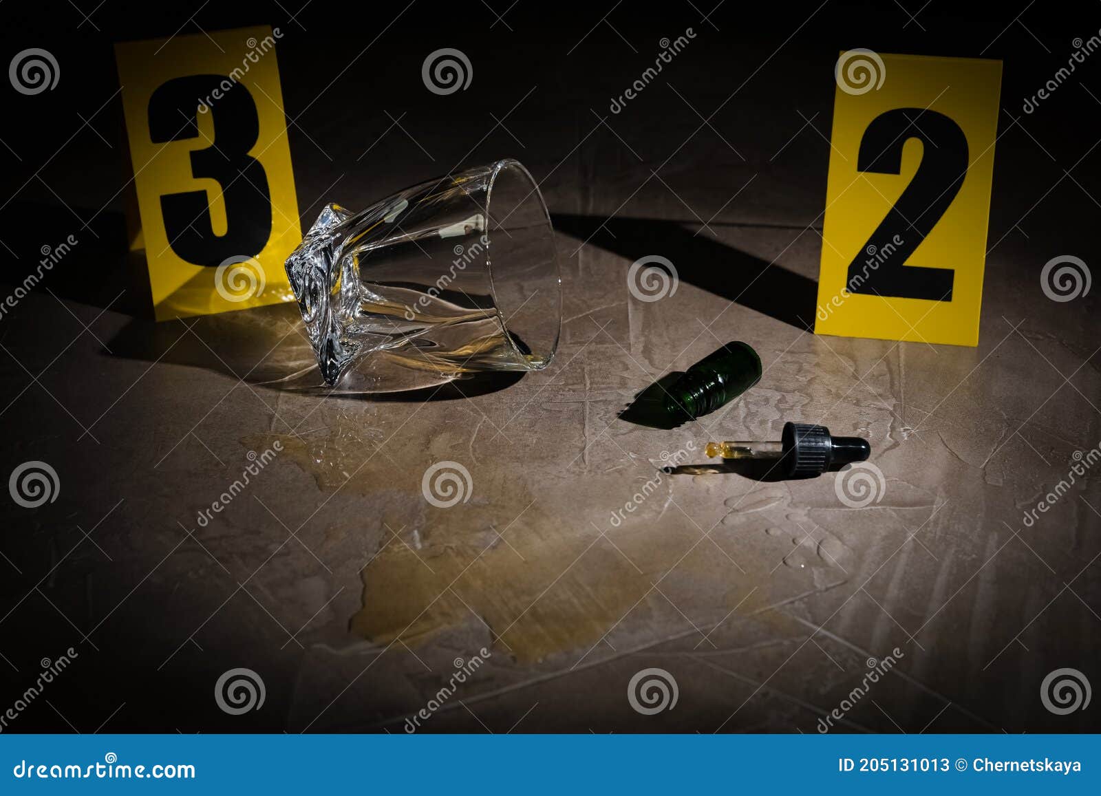 crime scene markers and evidences on grey stone table