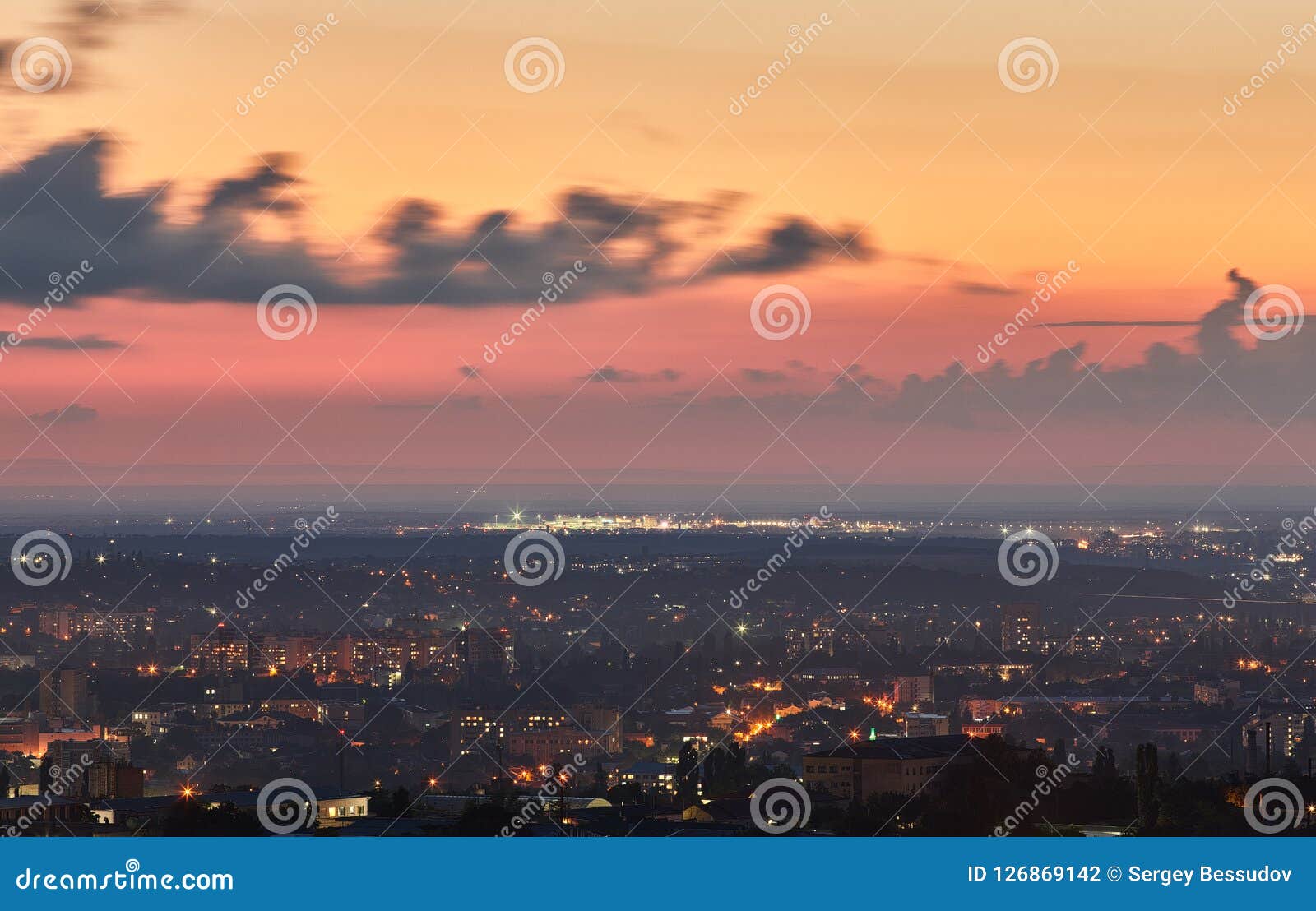 crimea. simferopol from a bird`s-eye view in the rays of the setting sun. the city is in the backlight.