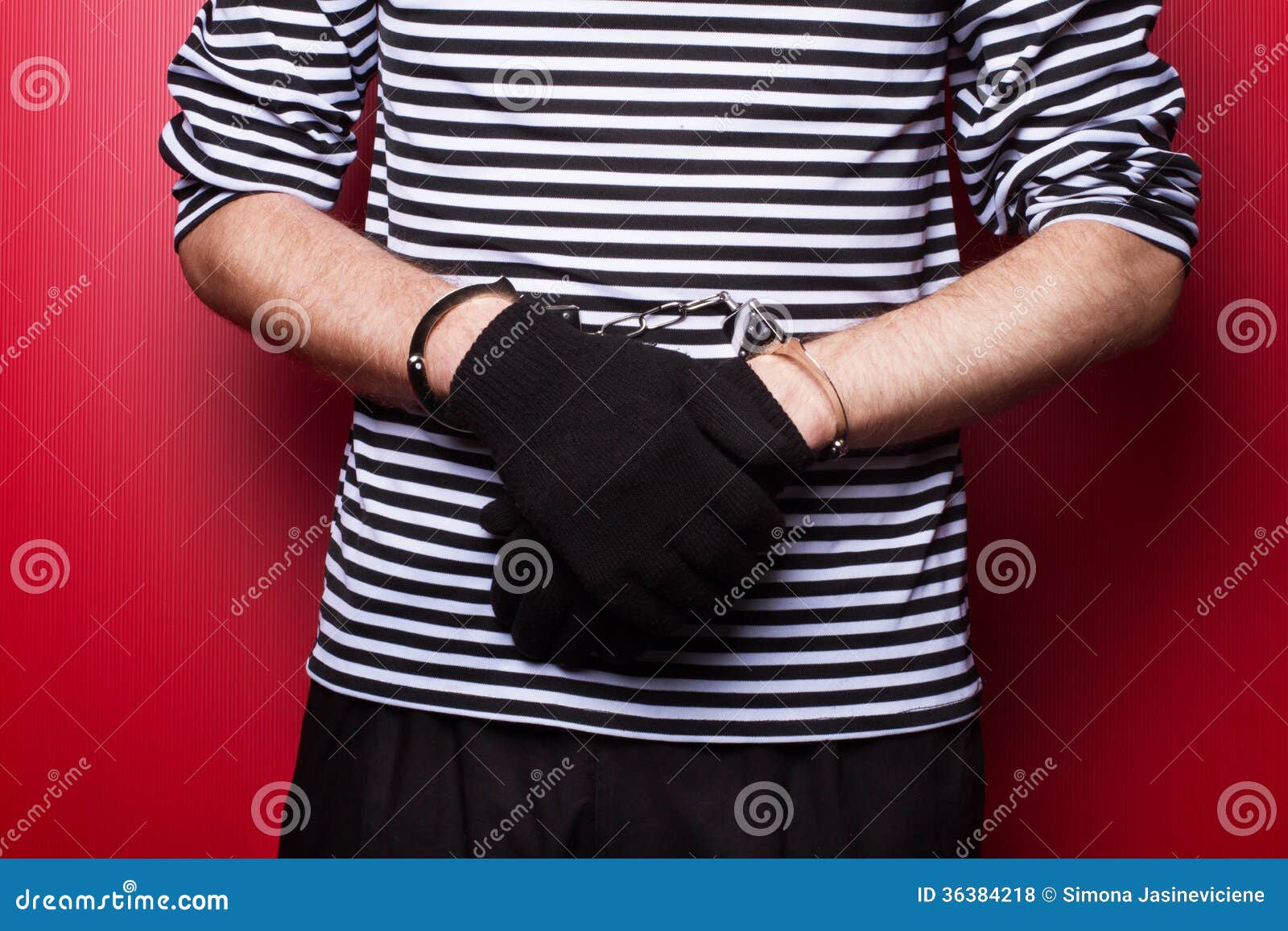 Criminal Hands Locked in Handcuffs. Closeup View Stock Photo Image