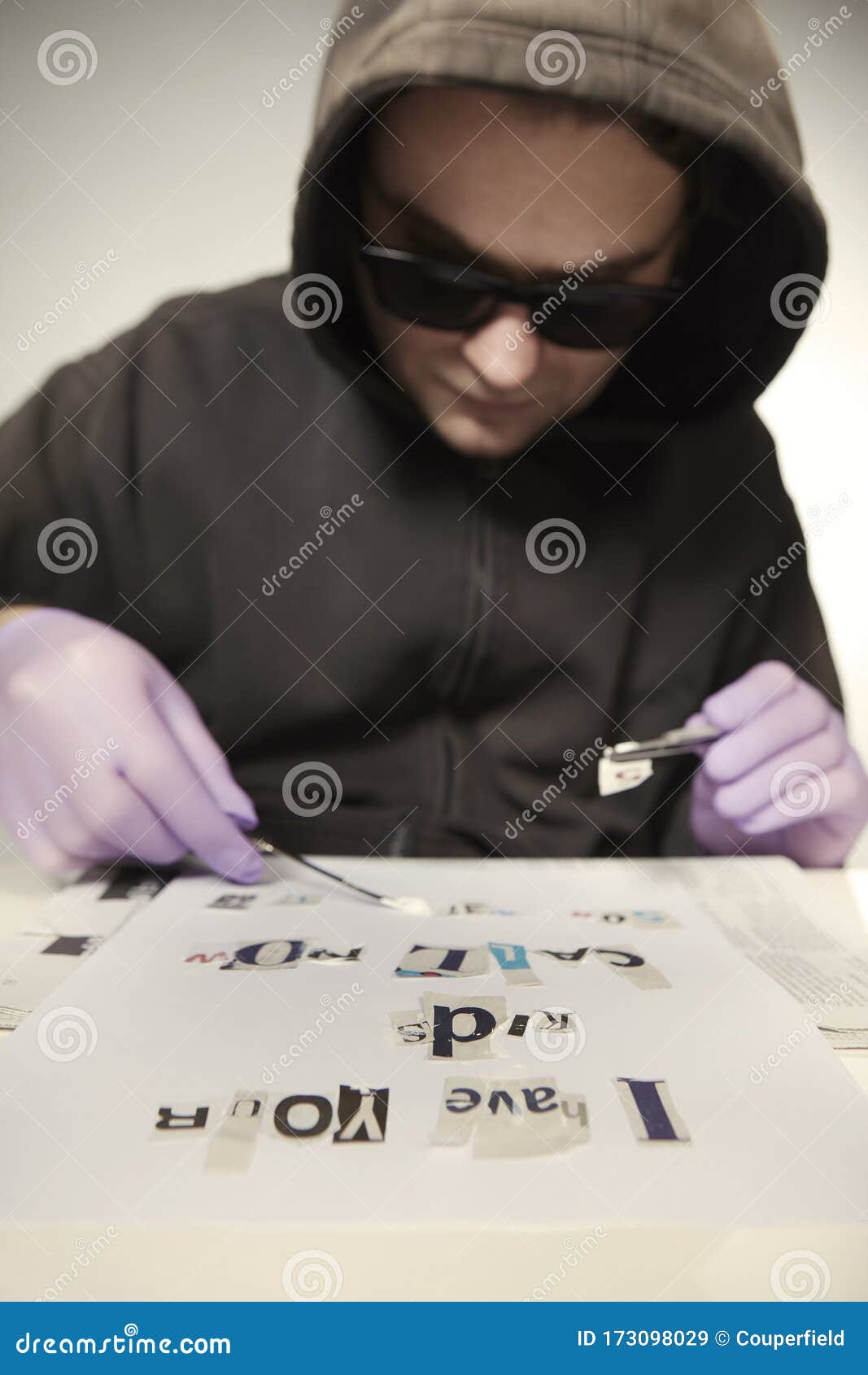 kidnapper of children making fingerprint free ransom letter for parents