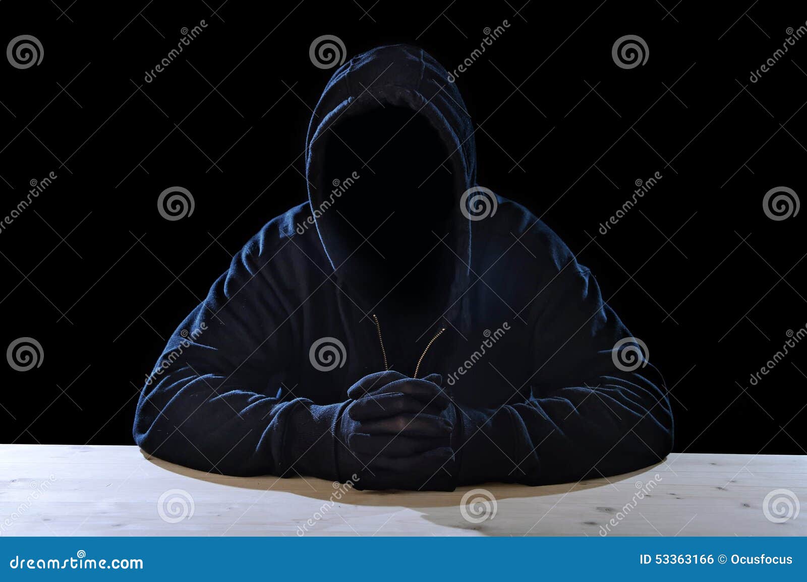 criminal or terrorist man in mask hidden identity in secret illegal activity crime concept