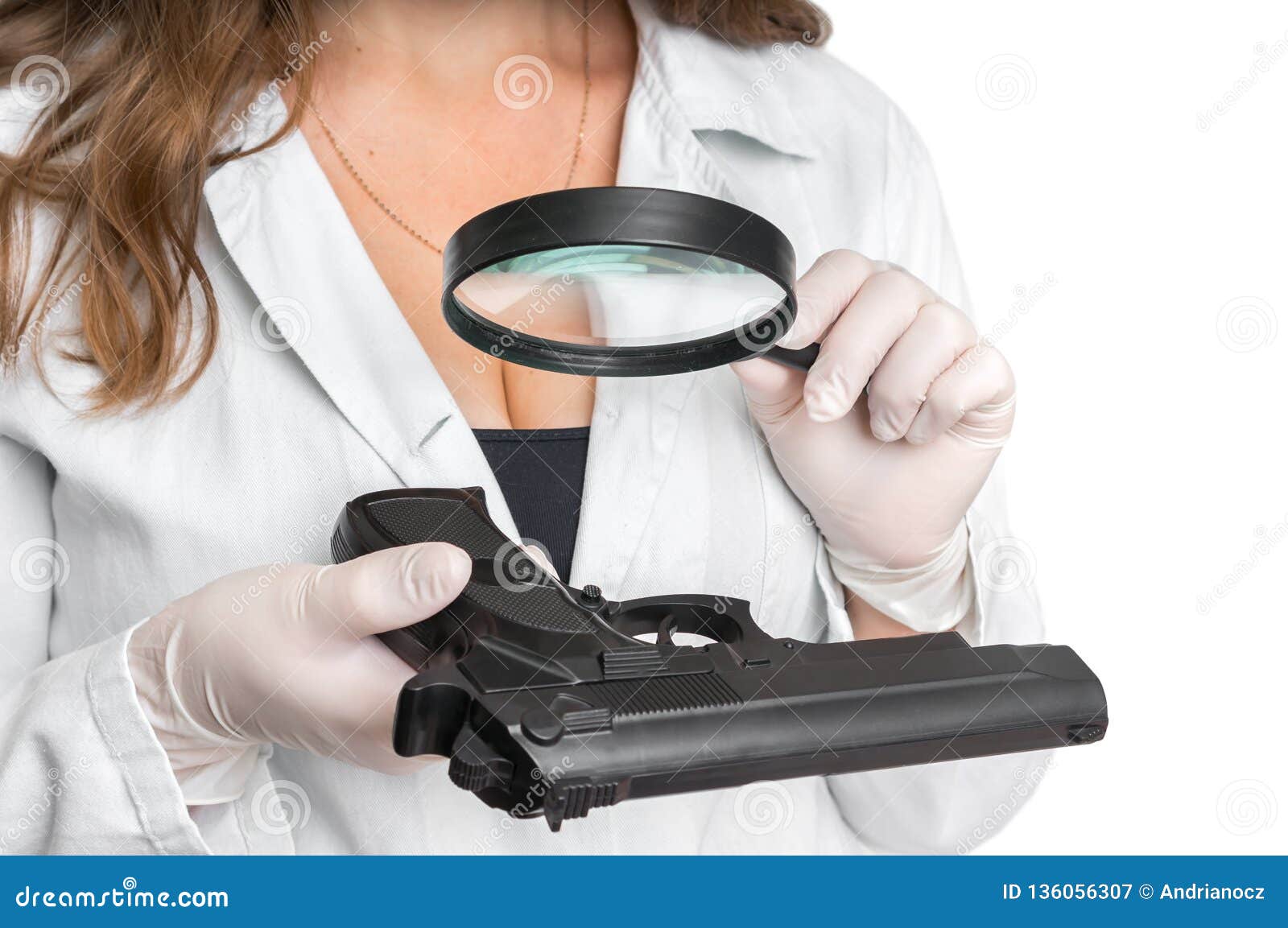 criminology expert looking at pistol and collects evidence