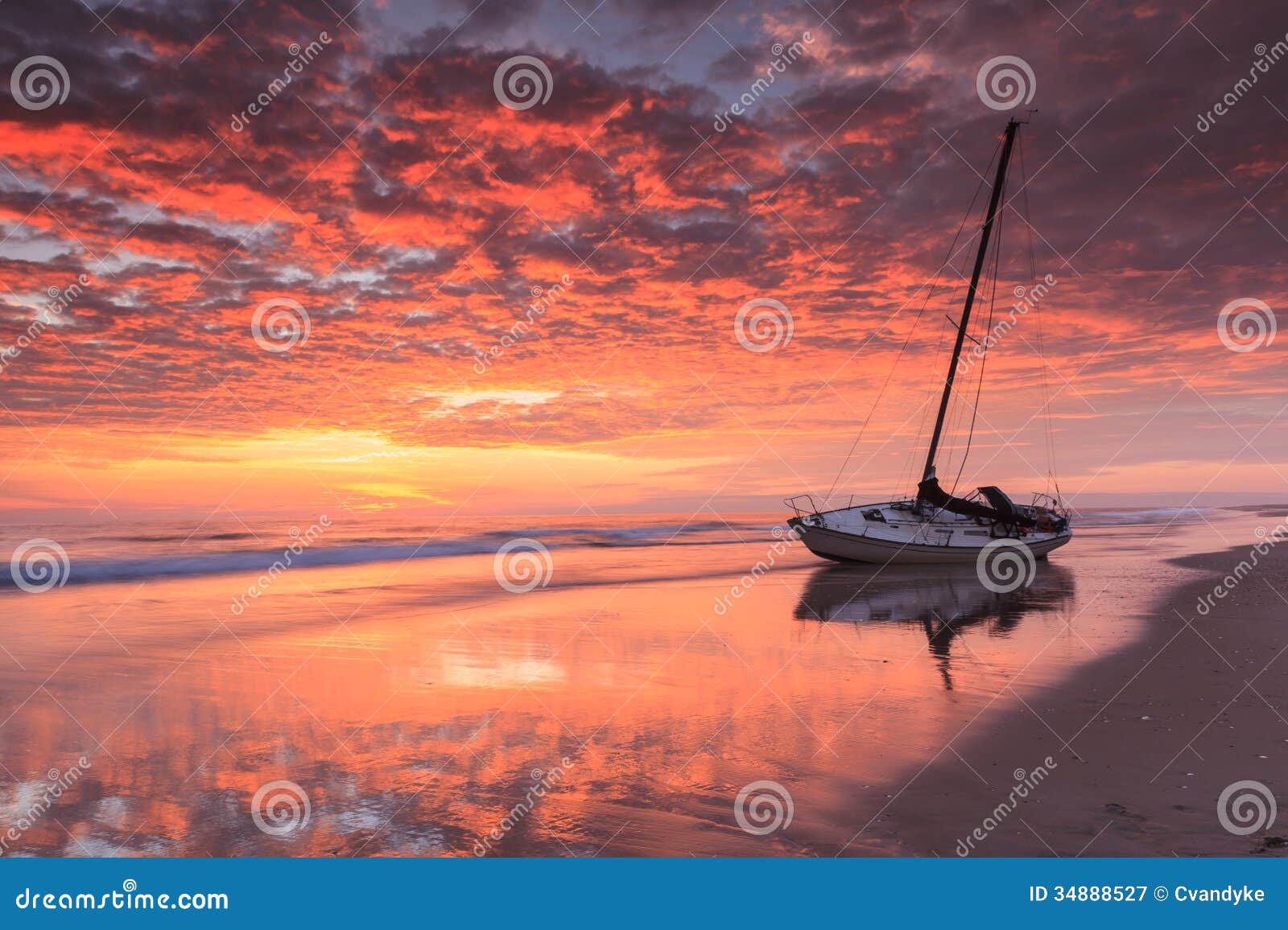 beached boats sailing hatteras sunrise north carolina shipwreck