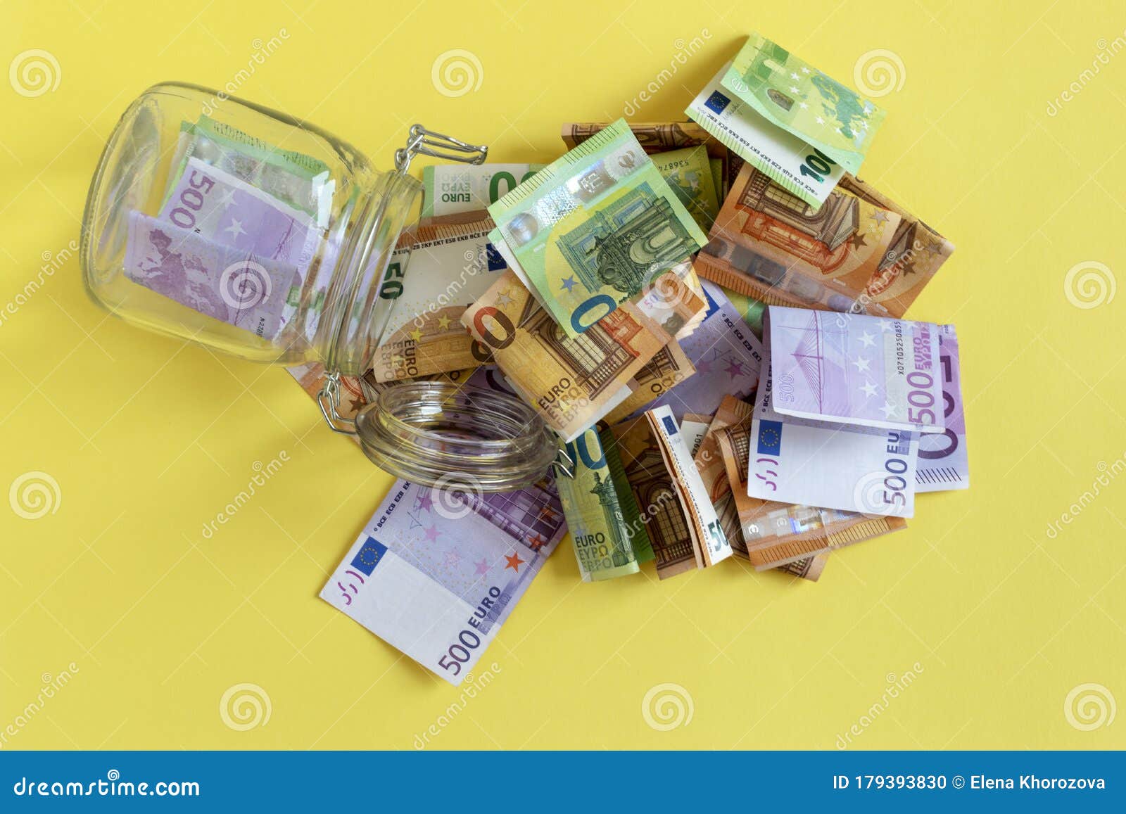 crisis and budget deficit concept. money and empty glass money jar. euro banknotes, money box. income, savings