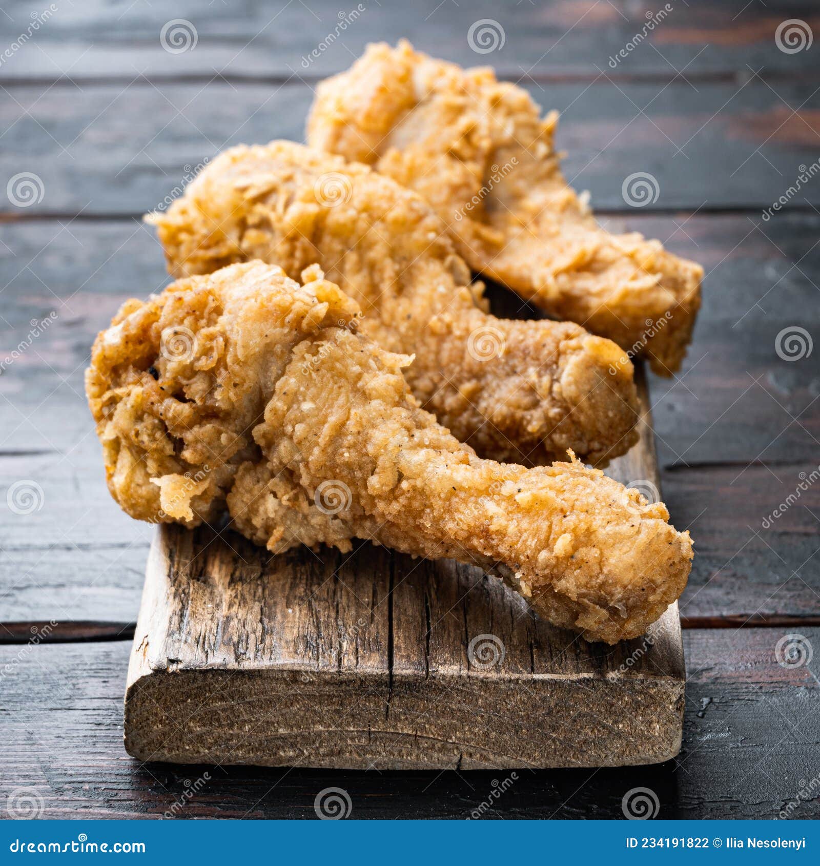 Crispy Fried Chicken Leg on Old Dark Wooden Table Stock Photo Image