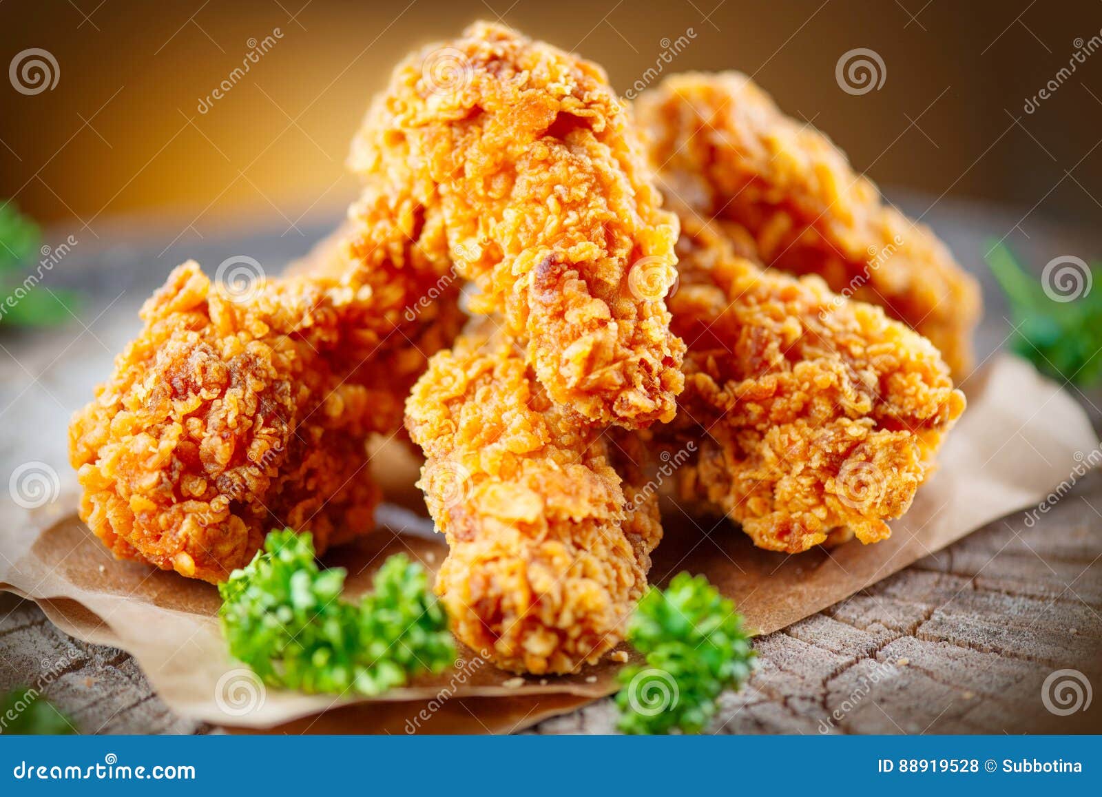 crispy fried chicken wings on wooden table