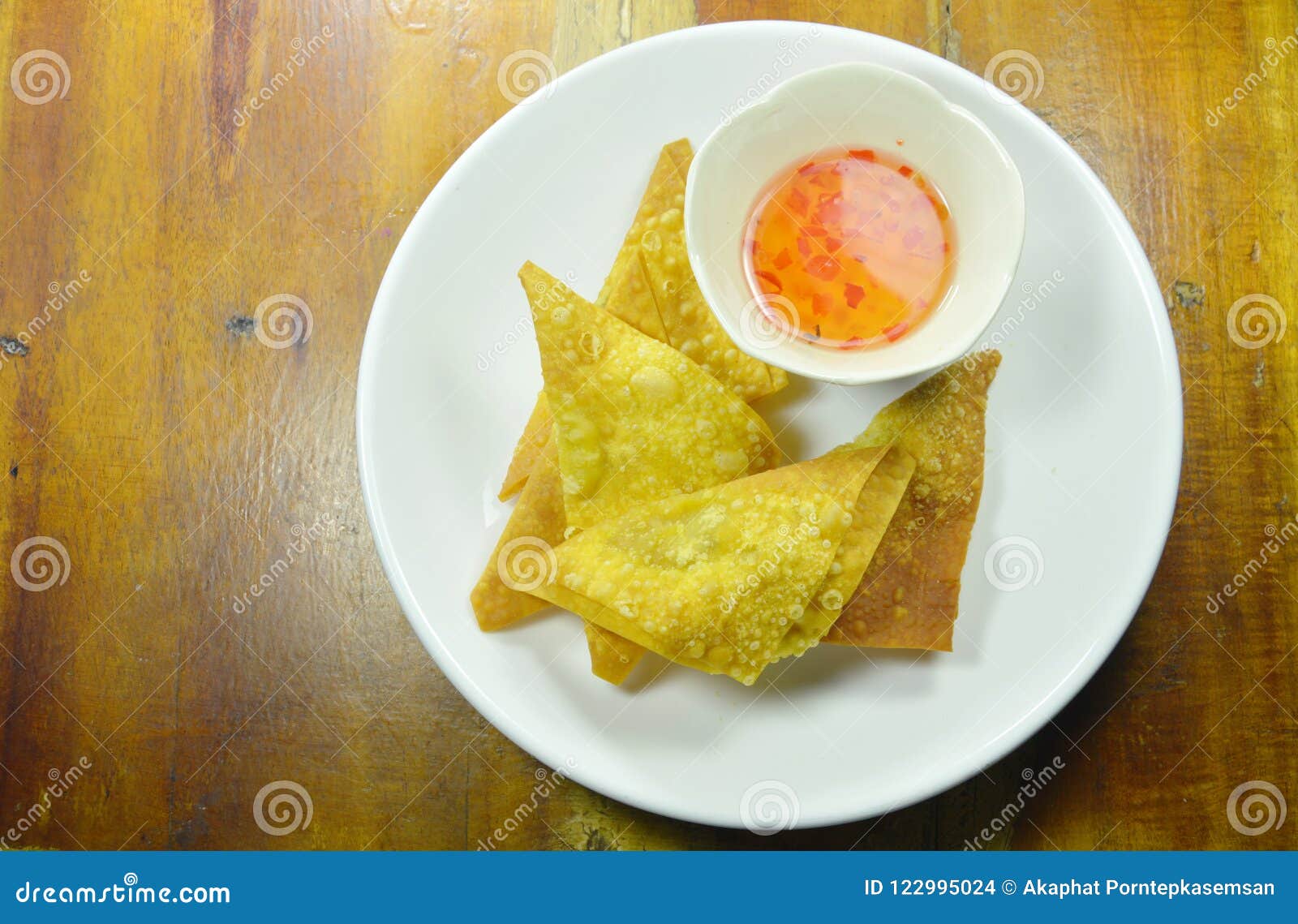 Crispy Fried Dumpling Paste Dipping Sweet Chili Sauce on Plate Stock