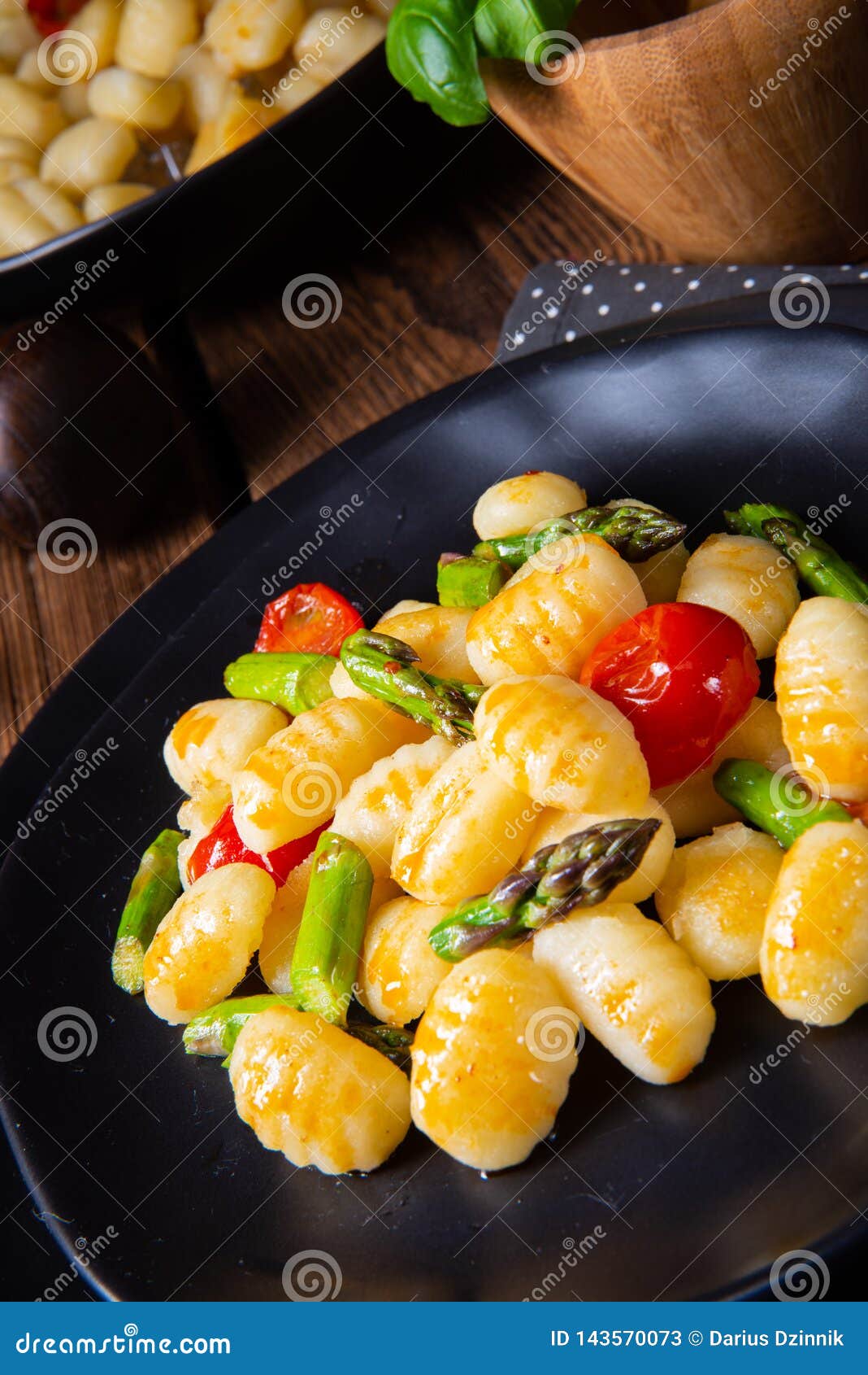 Crispy Gnocchi with Roasted Asparagus and Tomatoes Stock Image Image