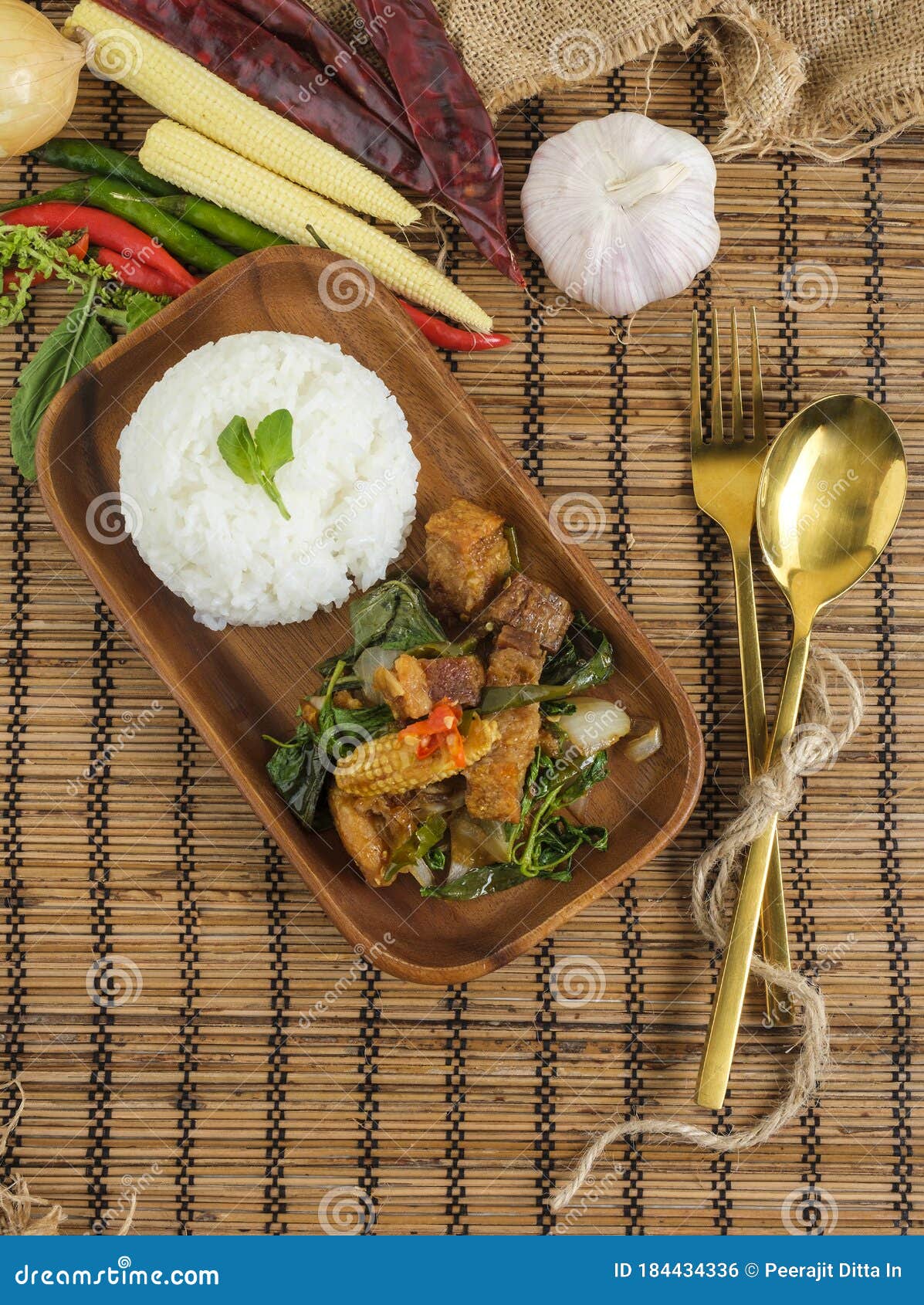 Crispy Pork Belly with Thai Basil. Classic Thai Dish Stock Photo