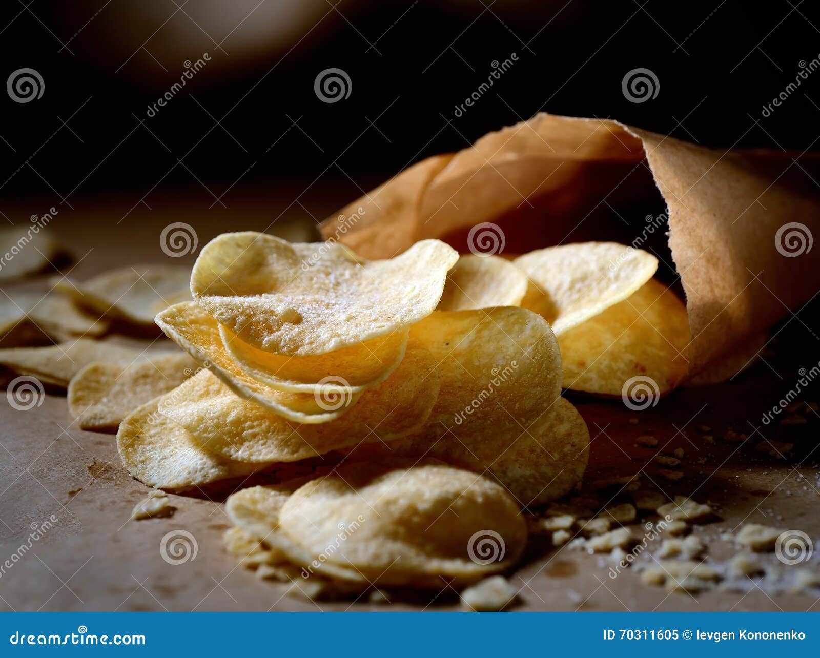 Crispy Potato Chips In Paper Bags On A Dark Background Stock Image