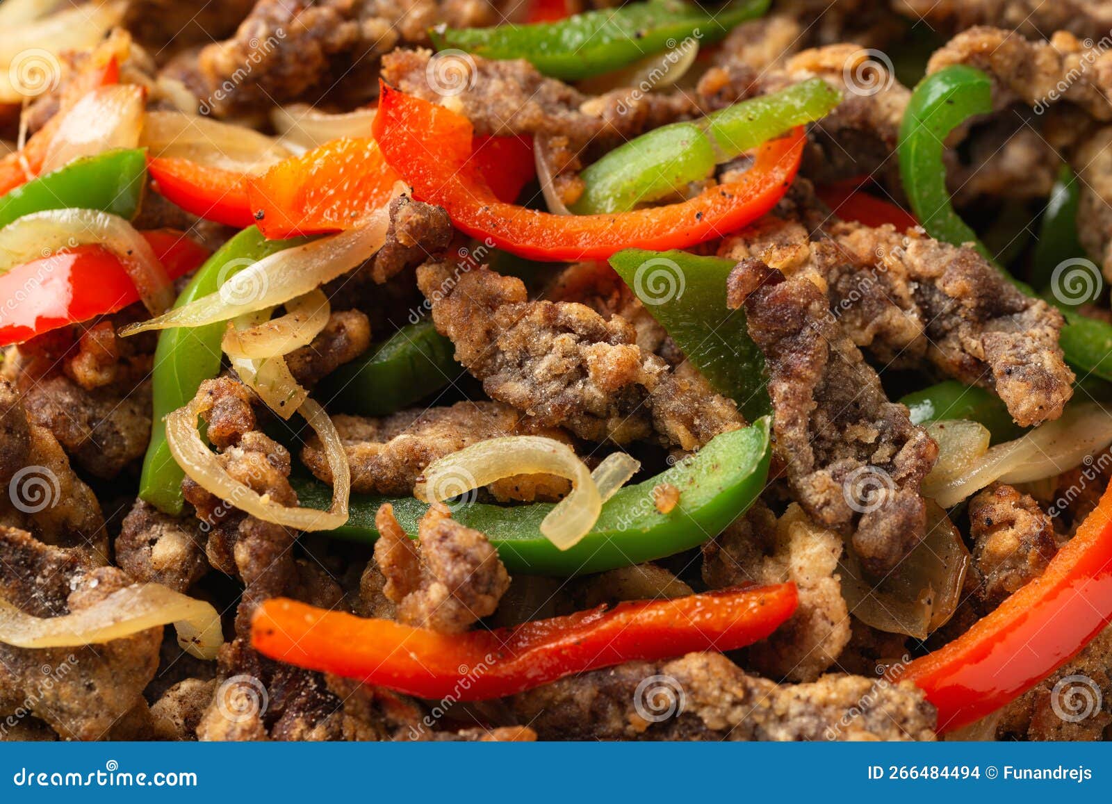 Crispy Salt and Pepper Beef with Onion and Bell Peppers Stock Photo