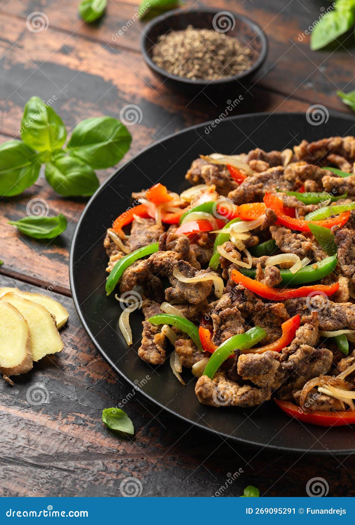 Crispy Salt and Pepper Beef with Onion and Bell Peppers Stock Image