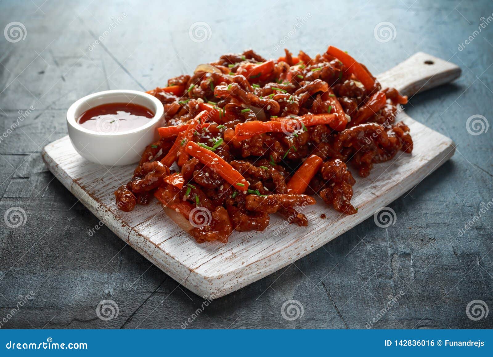 Crispy Shredded Beef With Carrots And Sweet Chilli Sauce On White Wooden Board Chinese Takeaway Food Stock Photo Image Of Lunch Brown 142836016