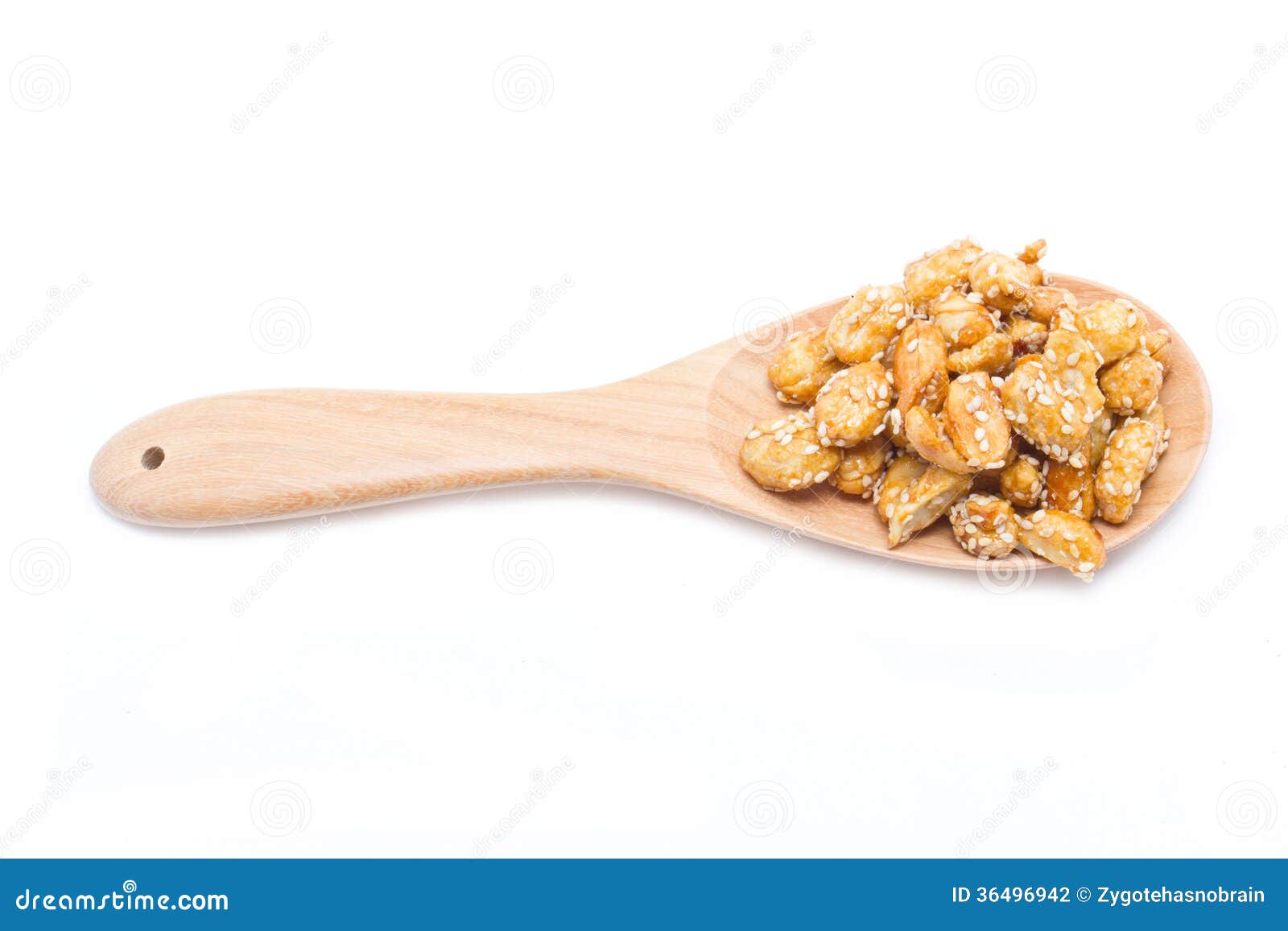 Crispy Sugared Nuts with Wooden Spoon. Stock Photo Image of