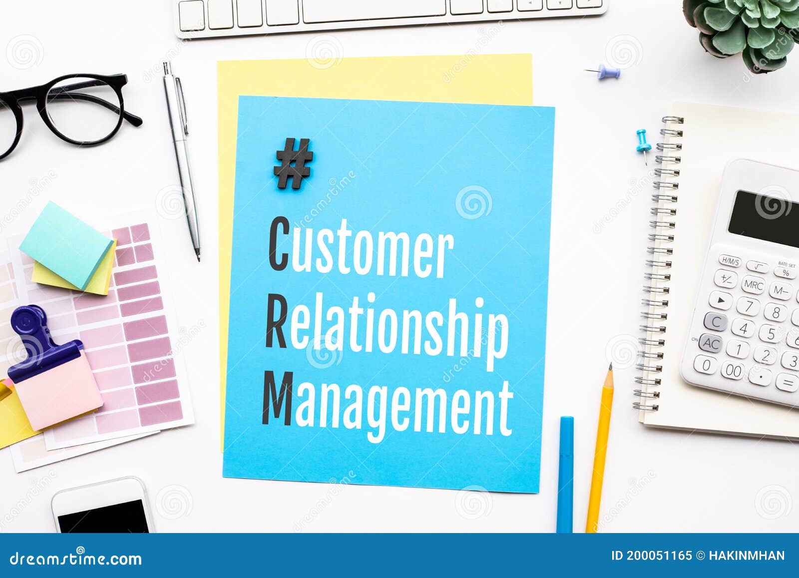 CRM,customer Relationship Management Concepts with Text on Desk Stock