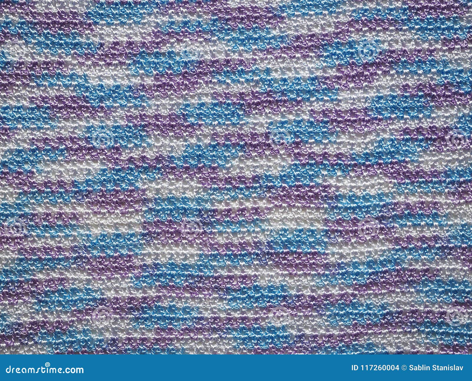 Crocheted Fabric Made of Multicolored Microfiber. Melange Thread