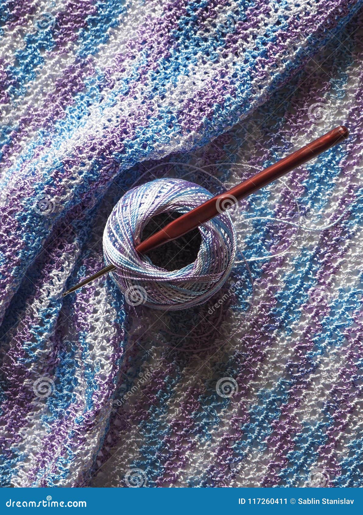 Crocheted Fabric Made of Multicolored Microfiber. Melange Thread