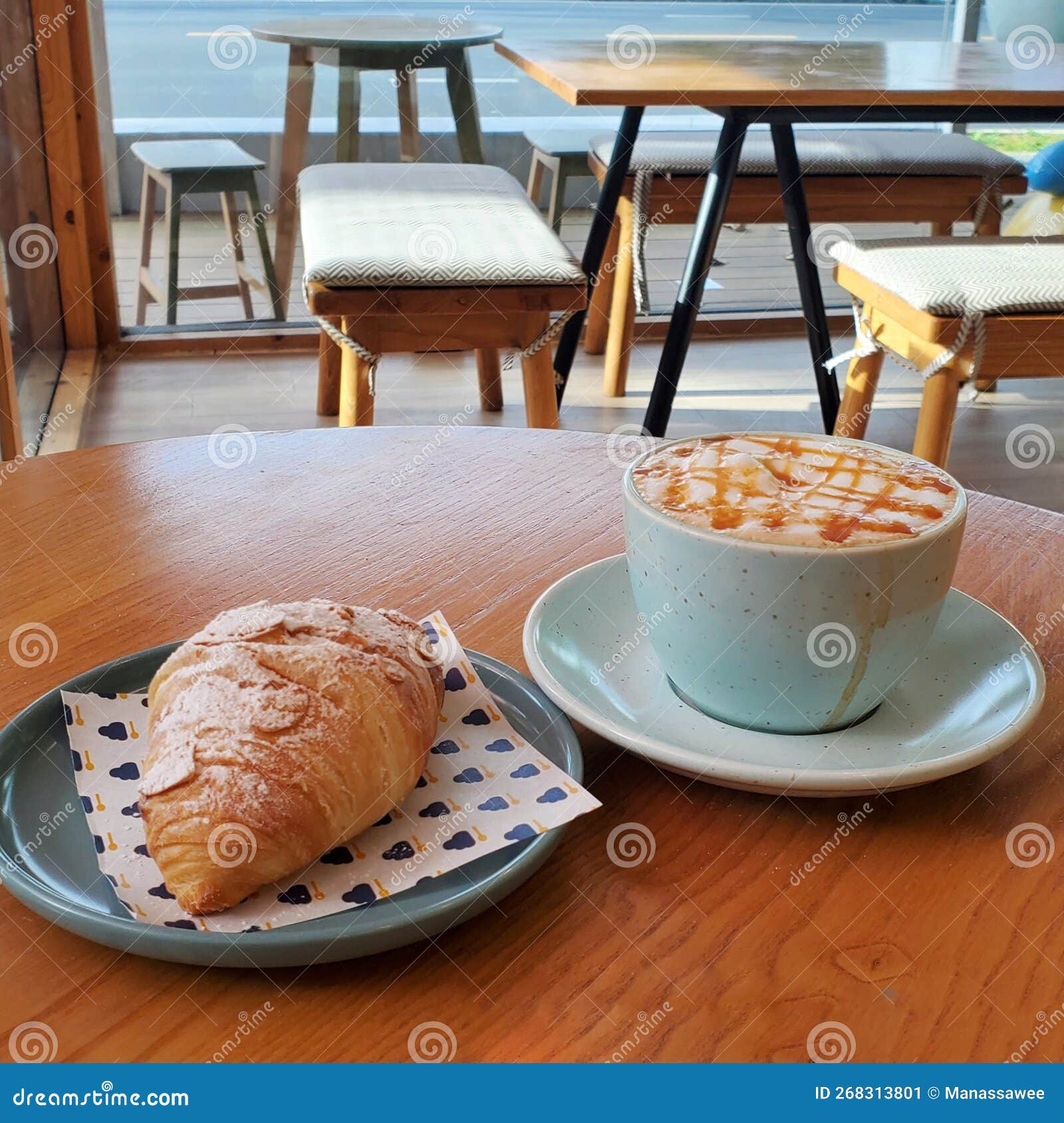 Croissant and Coffee on the Table at a Cafe Stock Image Image of