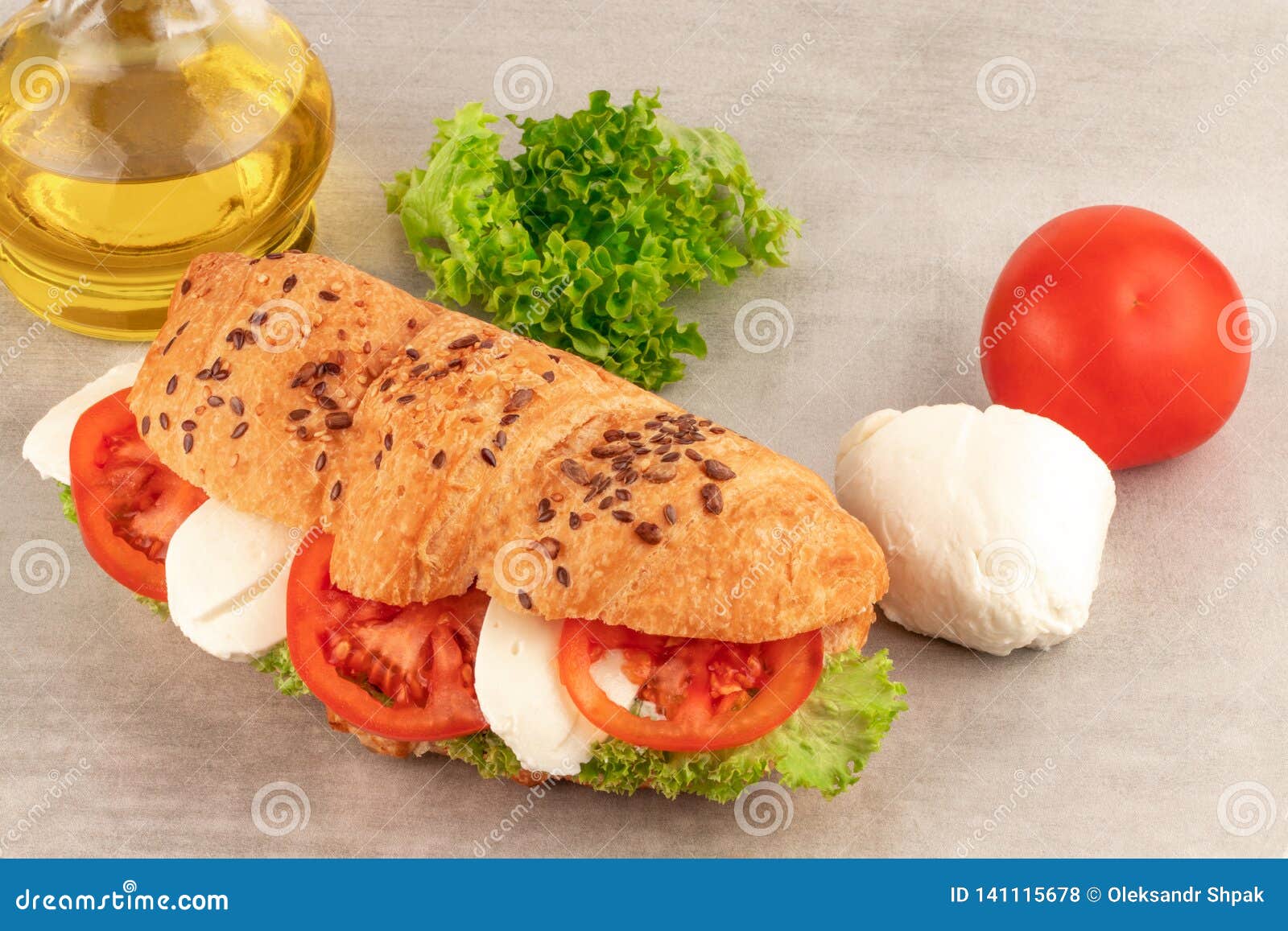 Croissant Sandwich with Lettuce Mozzarella and Tomato. Healthy Snack ...