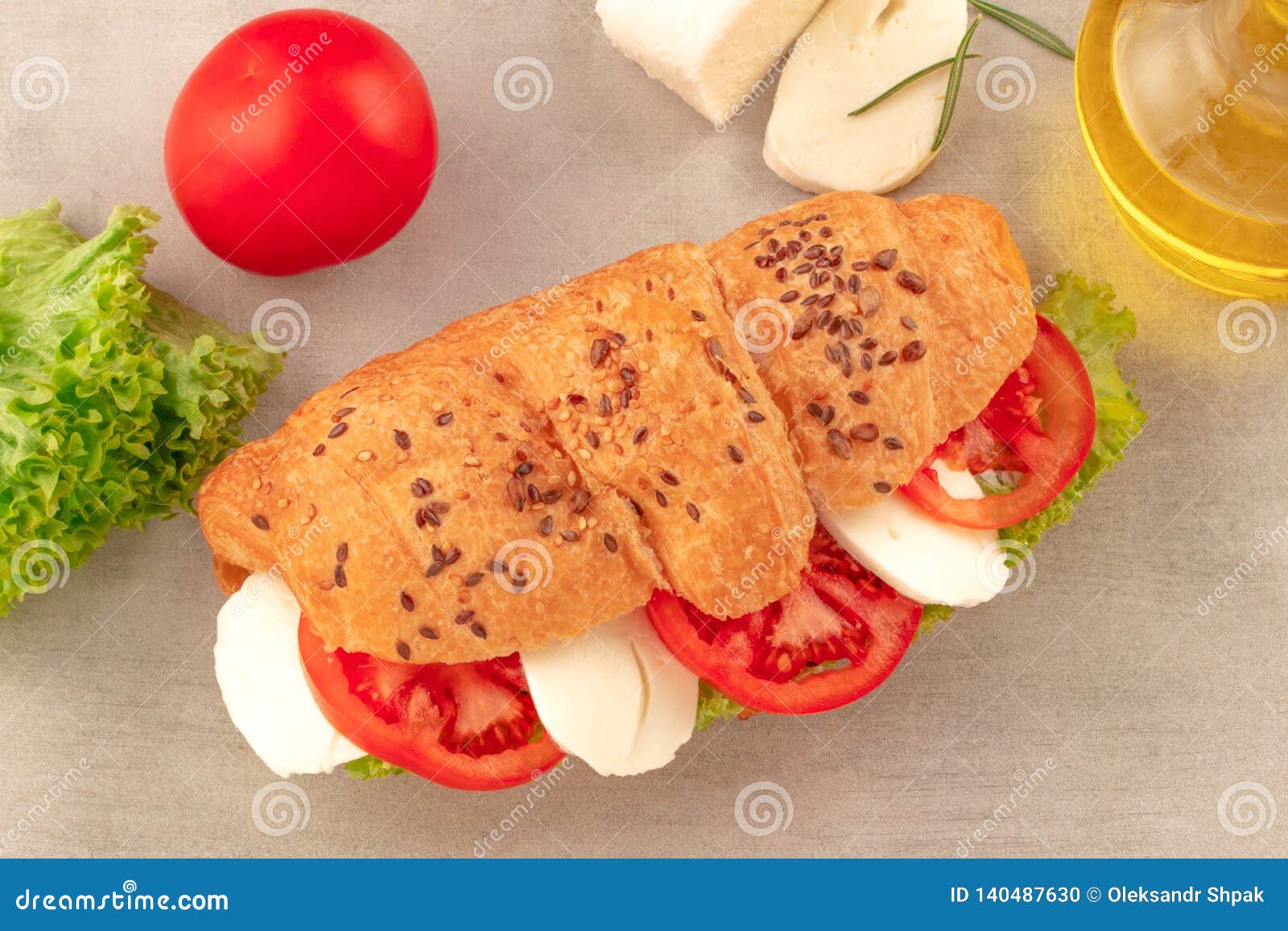 Croissant Sandwich with Lettuce Mozzarella and Tomato. Healthy Snack ...