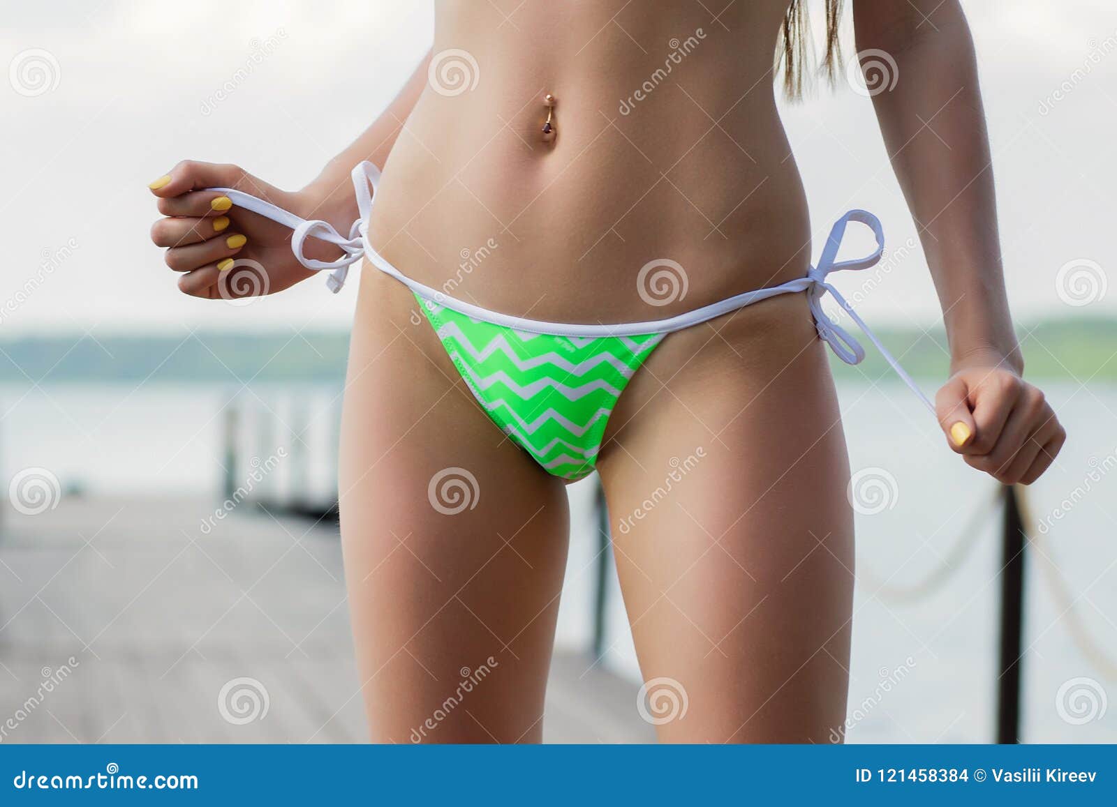 Female Untying Bikini Bottom Stock Photo - Image of summer