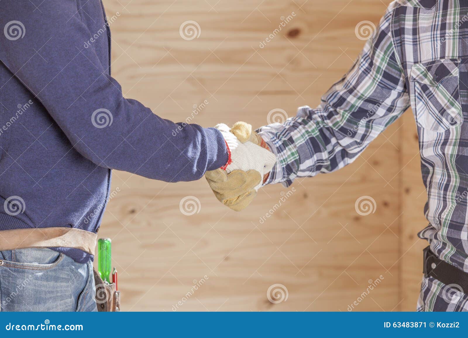 Cropped Image of Construction Workers Shaking Hands in Cabin at Site Stock Image Image of