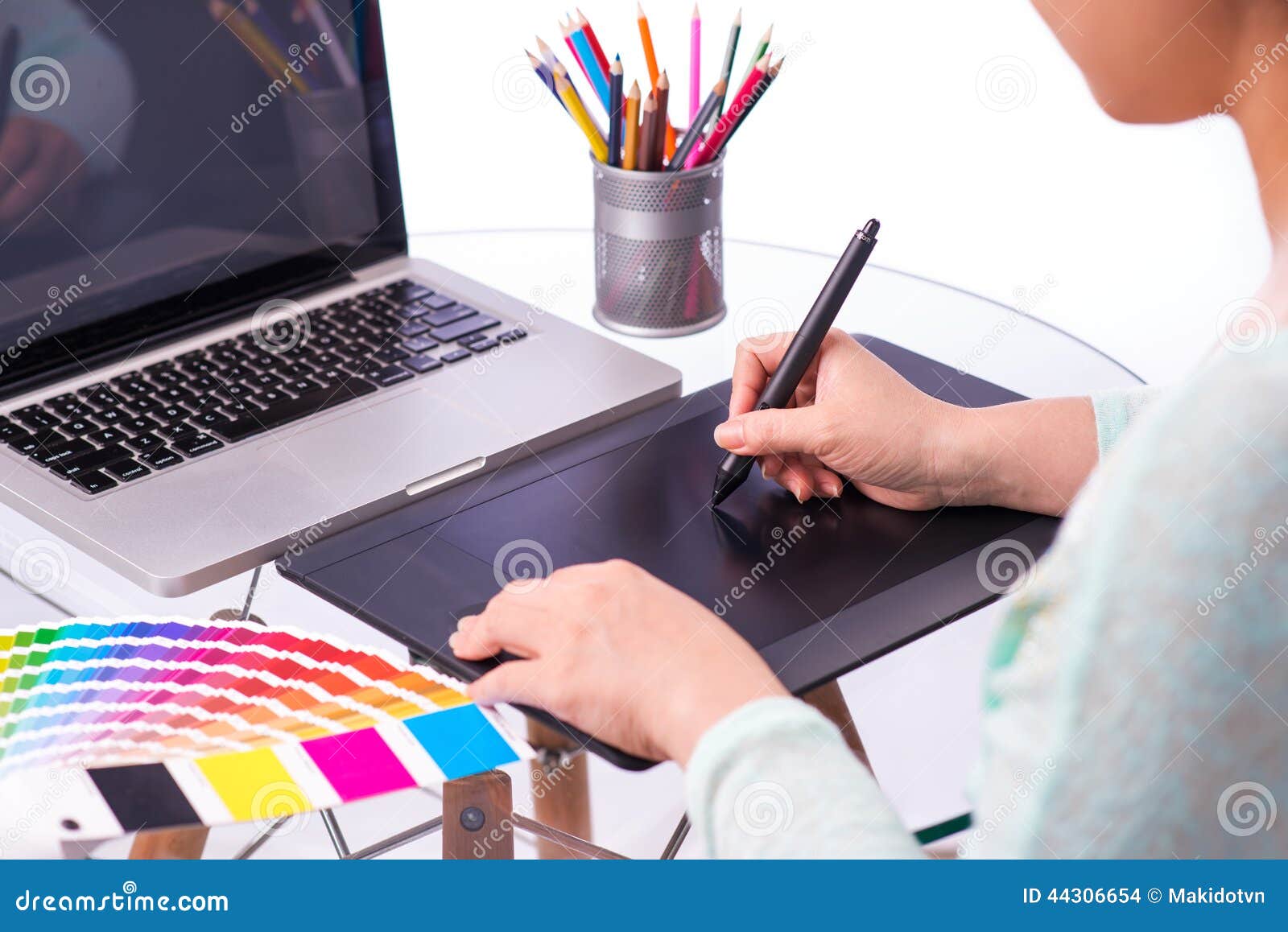 cropped image graphic designer using graphic tablet her work foreground concept digital working modern 44306654