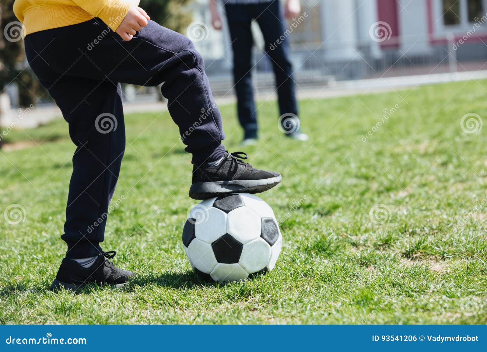 Cropped Image of a Little Boy with Football Playing Stock Photo Image