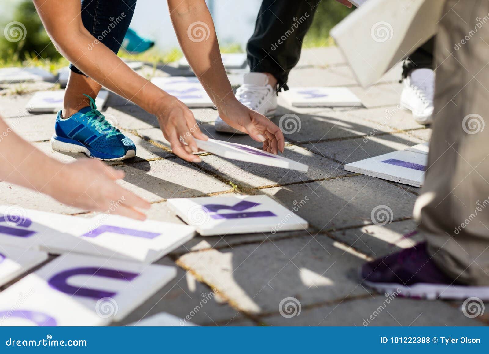 Cropped Image of Coworkers Solving Crossword Puzzle in Forest Stock Photo Image of leadership Cropped Image of Coworkers Solving Crossword Puzzle in Forest Stock Photo Image of leadership