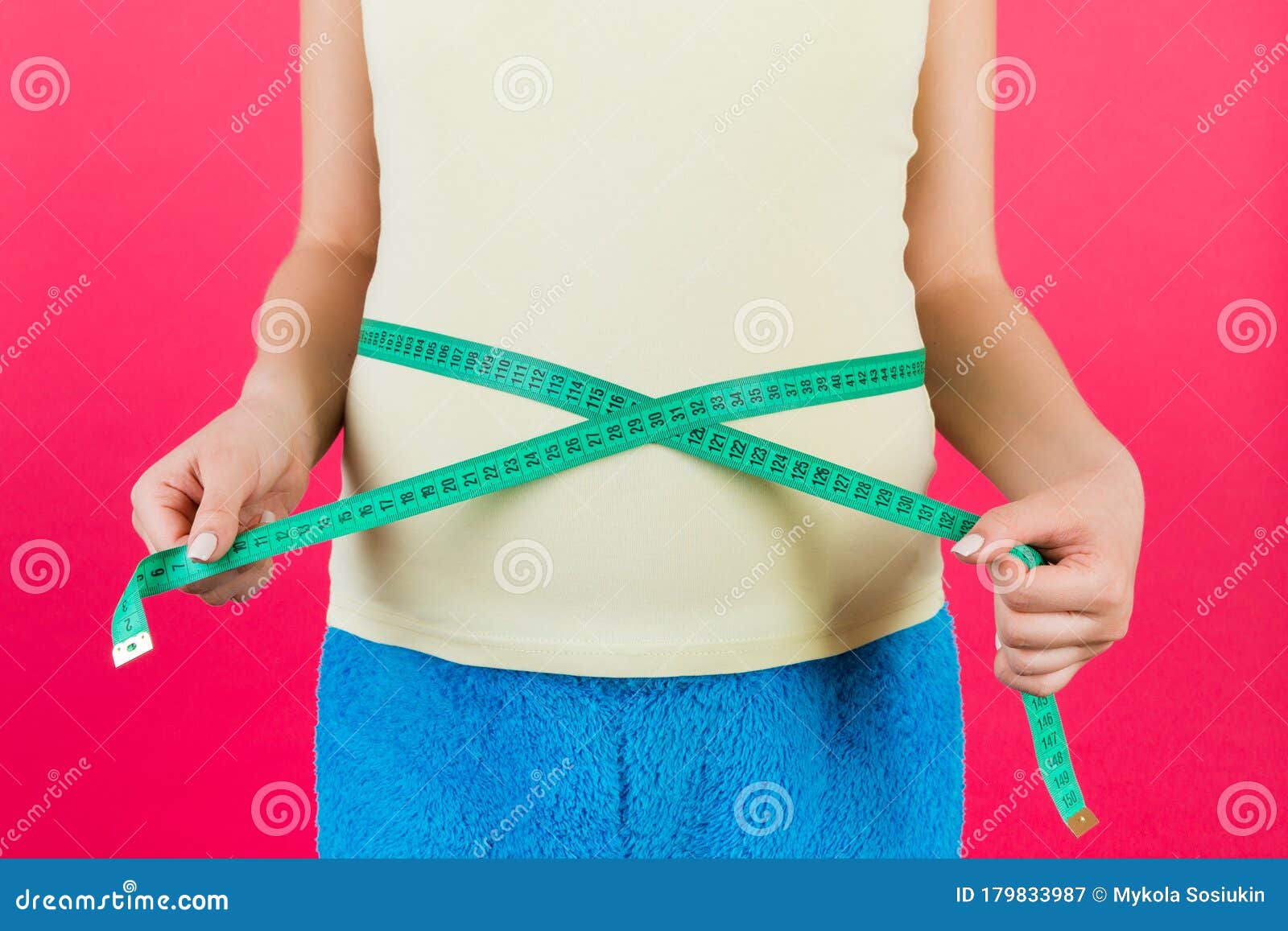 Cropped Image of Pregnant Woman in Colorful Home Clothing Measuring Her  Abdomen To Check Baby Development. Centimeter Tape Measure Stock Image -  Image of close, growing: 179833987