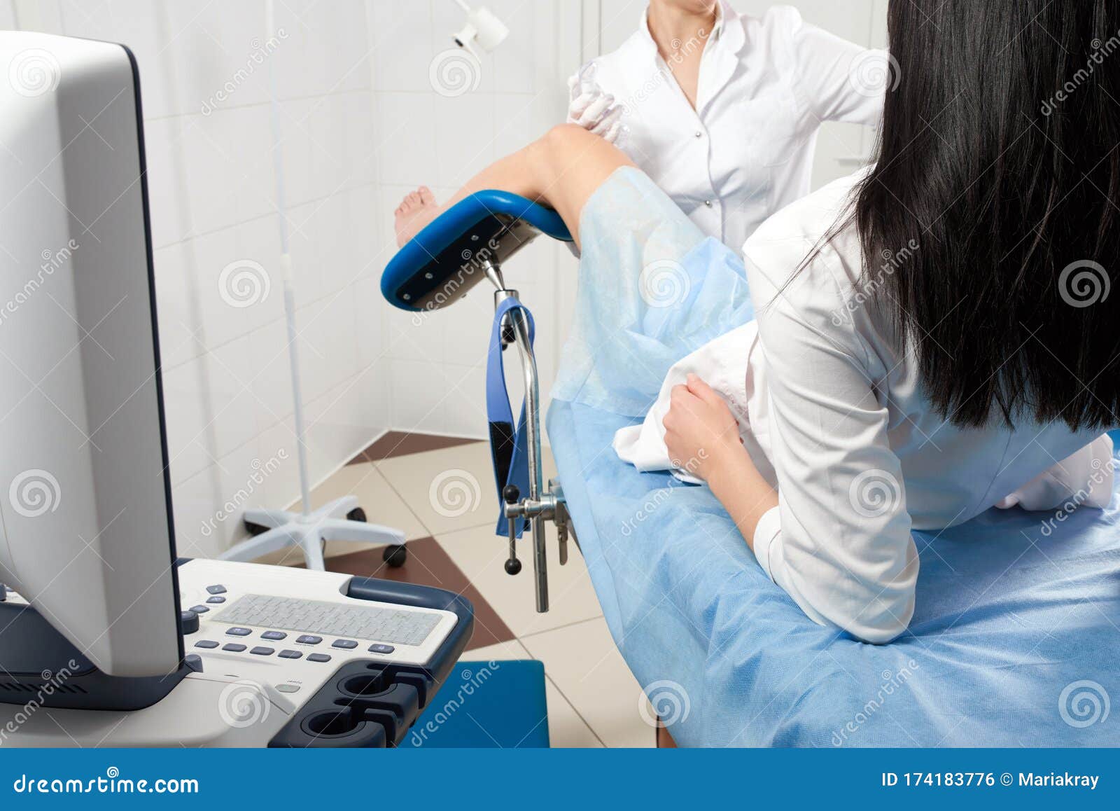 Cropped Panorama Of Gynecologist Examining A Patient Who Is Sitting In A Gynecological Chair 