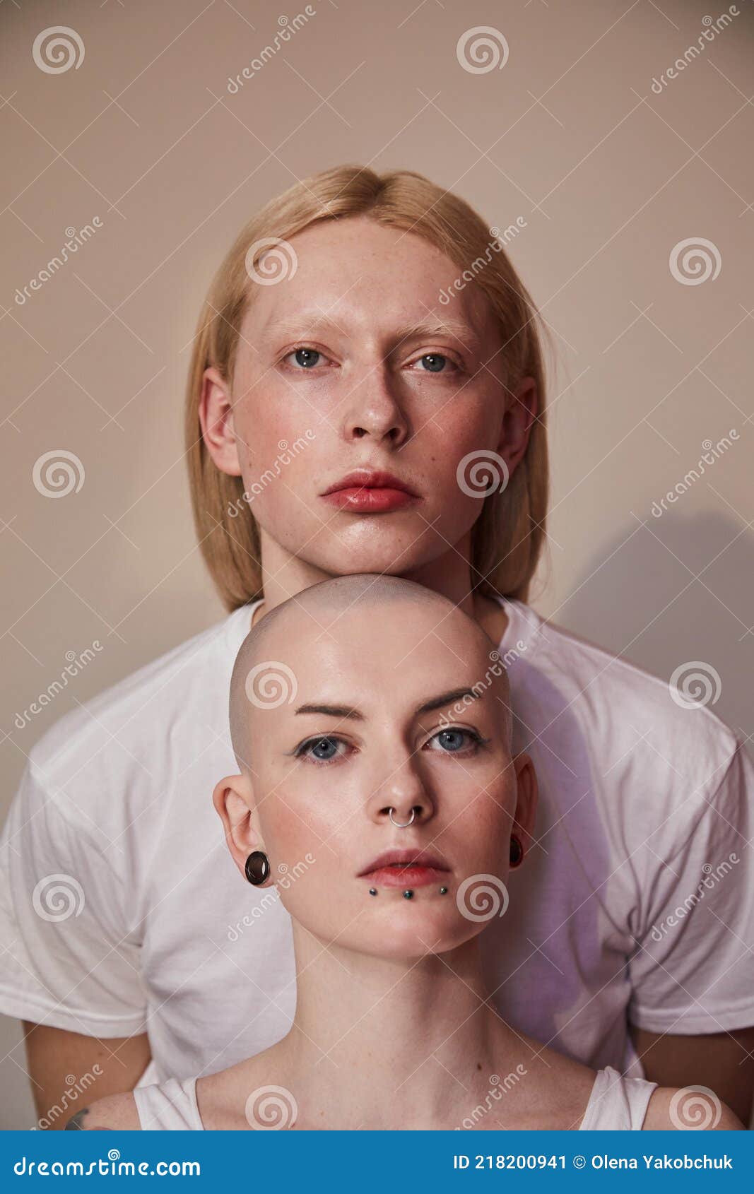 Womanly Long Haired Man Standing Behind the Bald Masculine Woman while  Posing Stock Image - Image of portrait, albino: 218200941