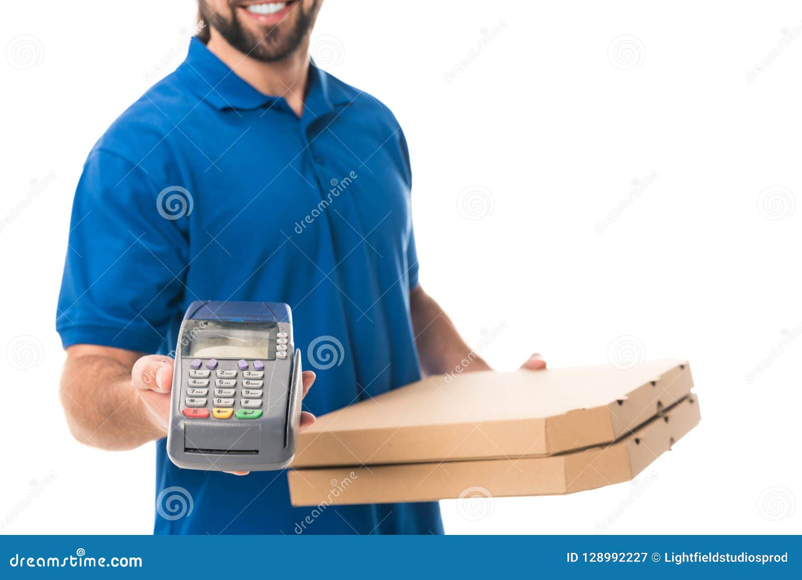 cropped shot of smiling delivery man holding payment terminal and boxes with pizza