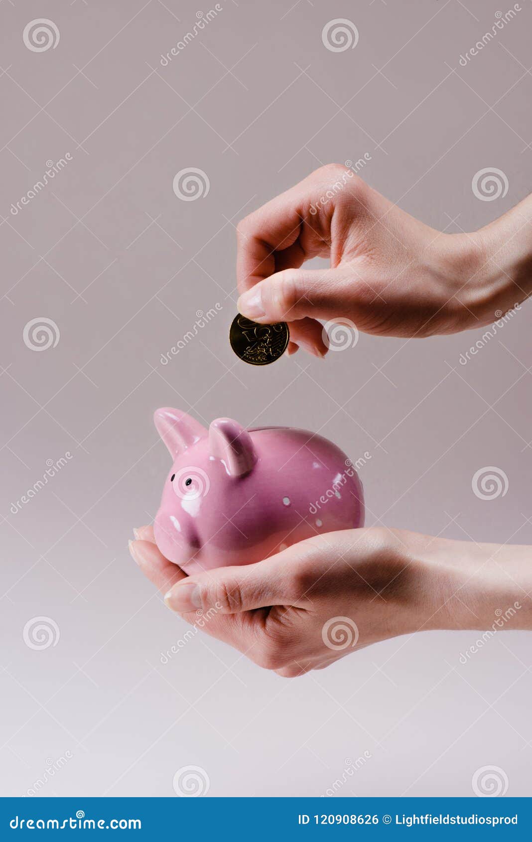 Cropped Shot Of Woman Putting 50 Euro Cent Into Pink Piggy Bank In Hand Stock Photo - Image of ...