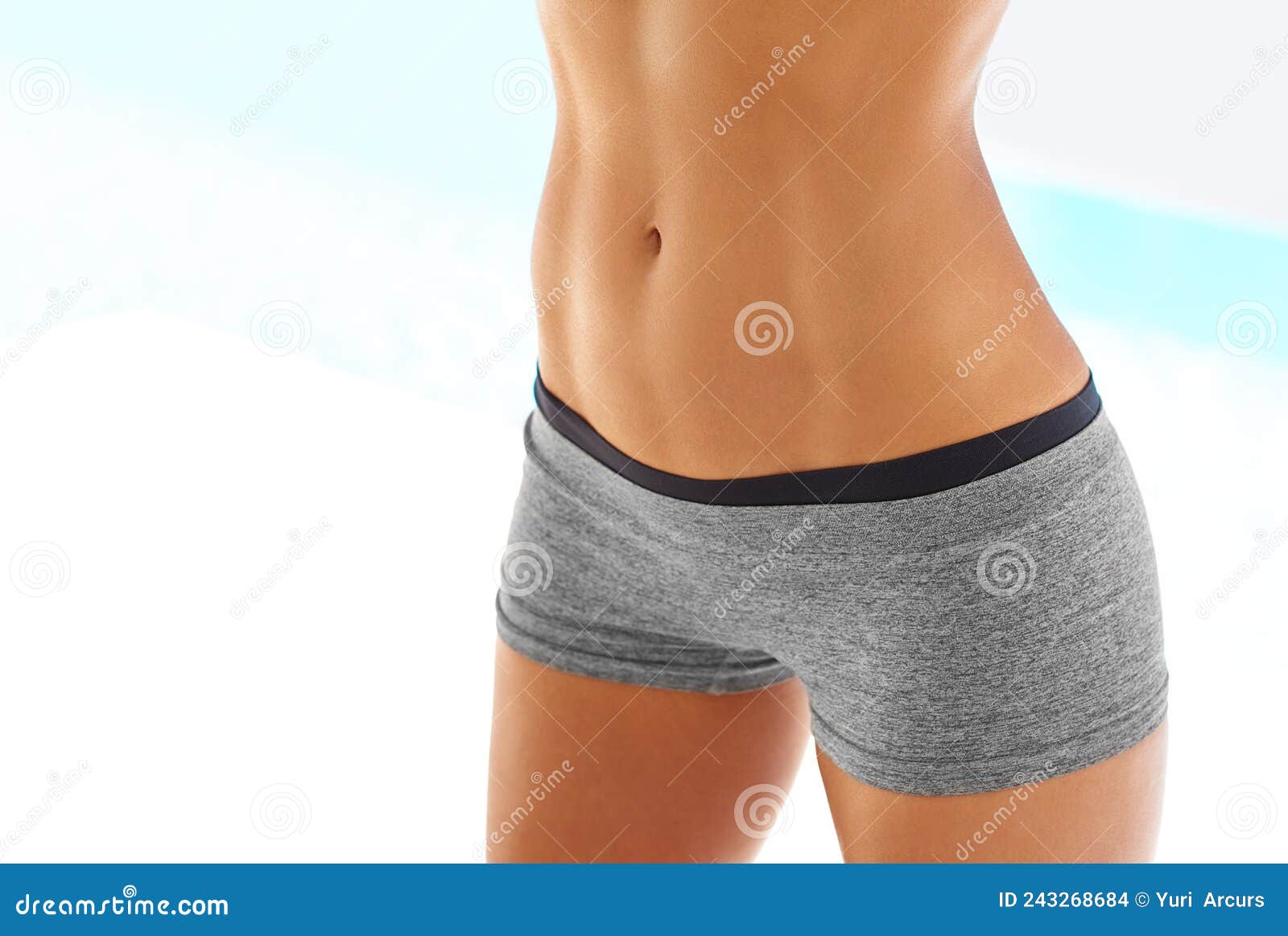 You Earn Your Body. Cropped Shot of a Woman with a Toned Stomach