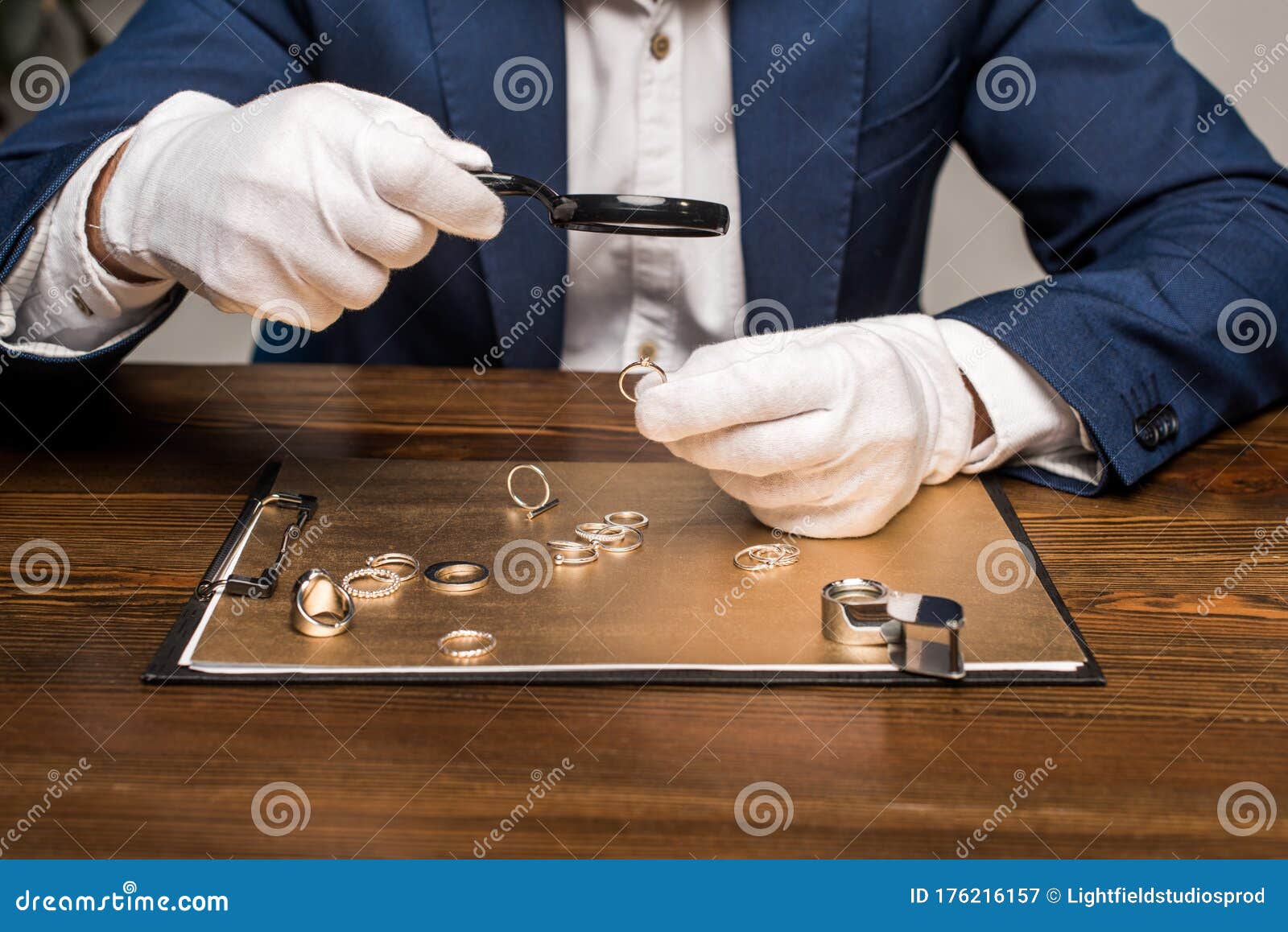 View Of Jewelry Appraiser With Magnifying Stock Image ...