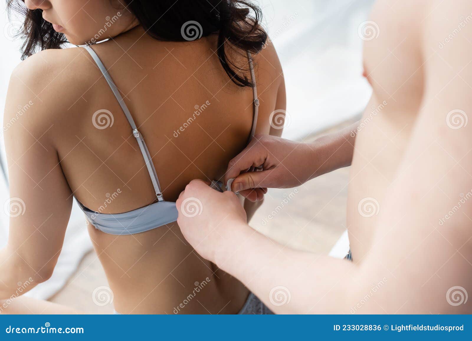 Cropped View of Man Unhooking Bra Stock Photo - Image of couple