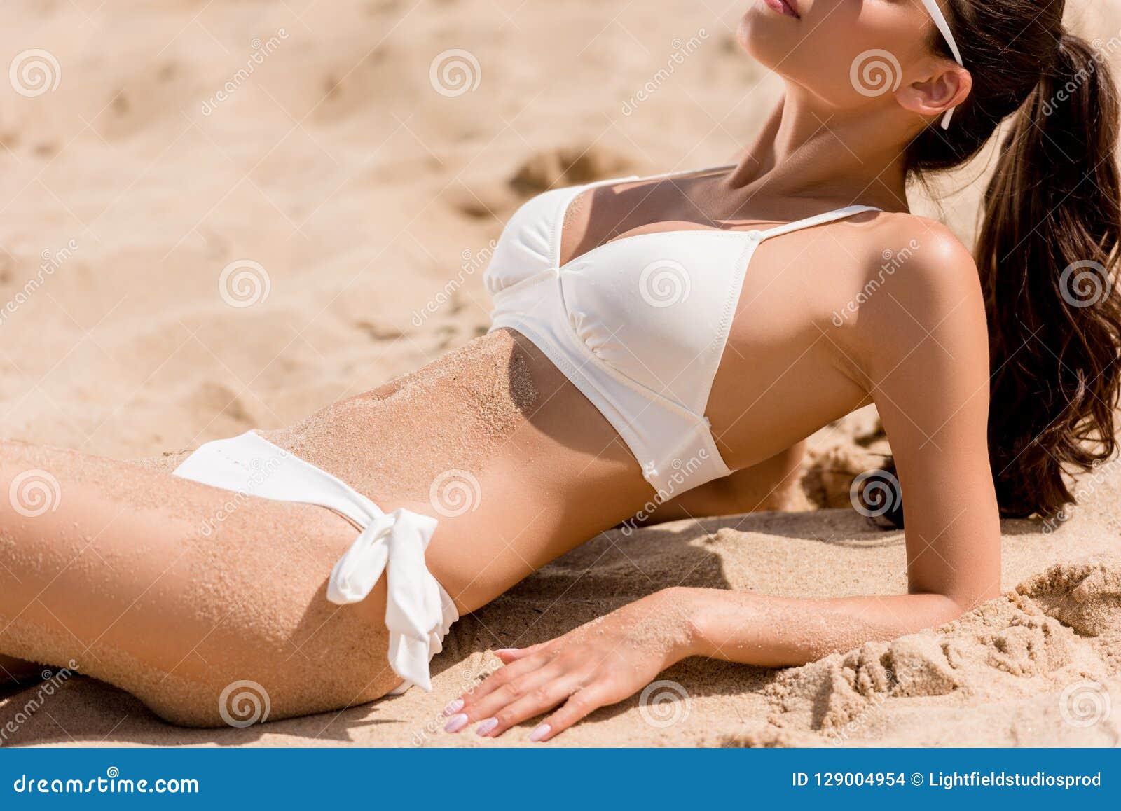 Cropped view slim girl stock photo. Image of lying - 129004954