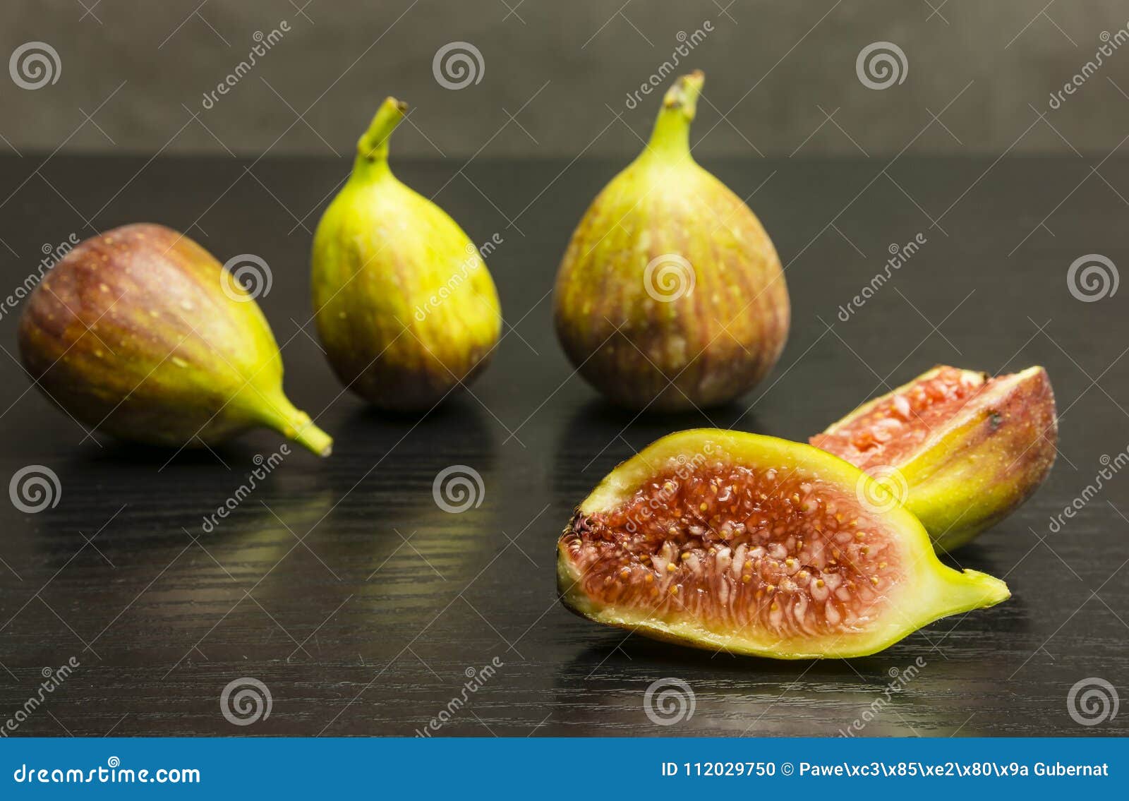 Crosssection through Fresh Fig Fruit. Stock Photo Image of group