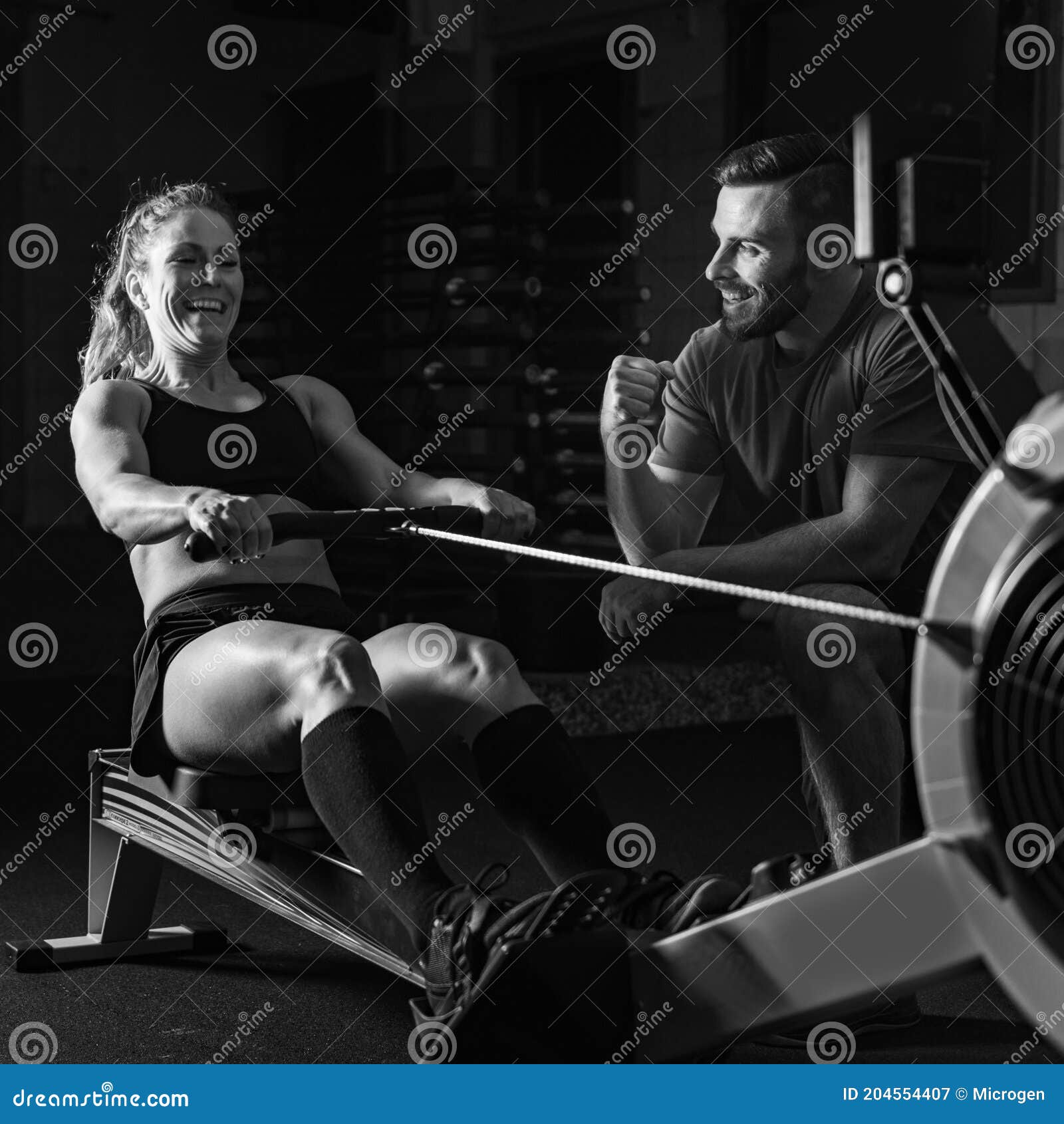 Cross Training. Rowing Machine Exercising Stock Image Image of black