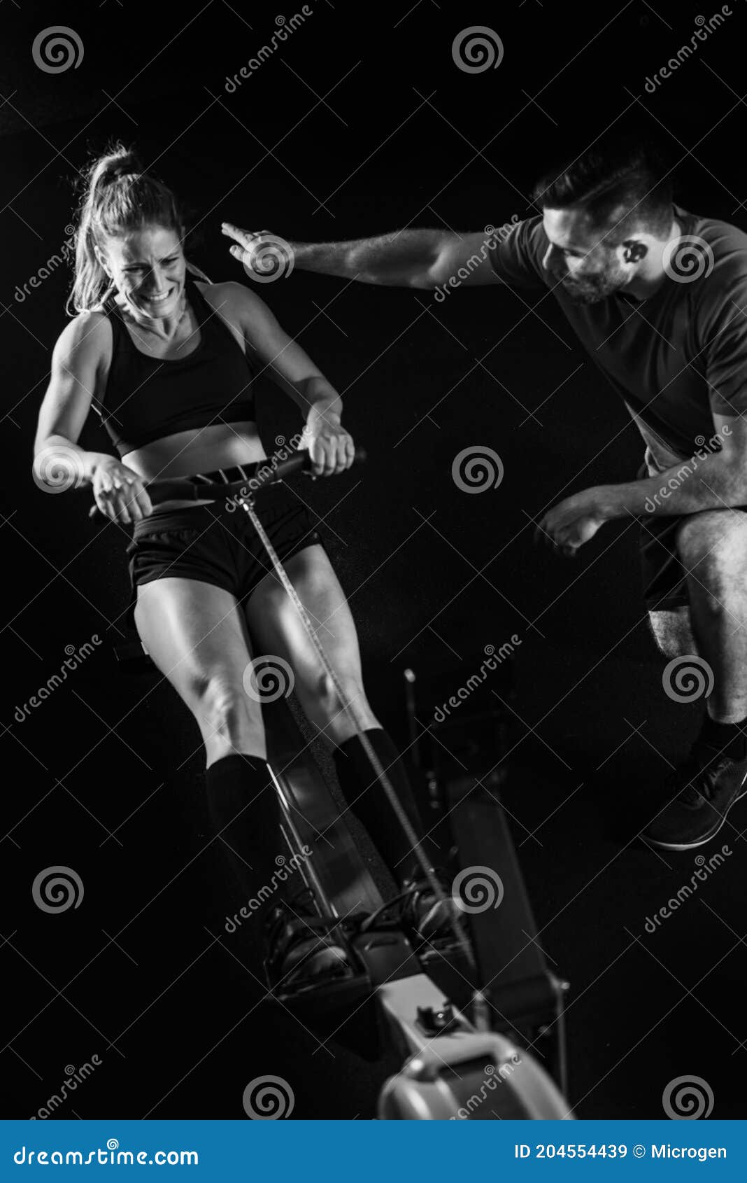 Cross Training. Rowing Machine Exercising Stock Image Image of