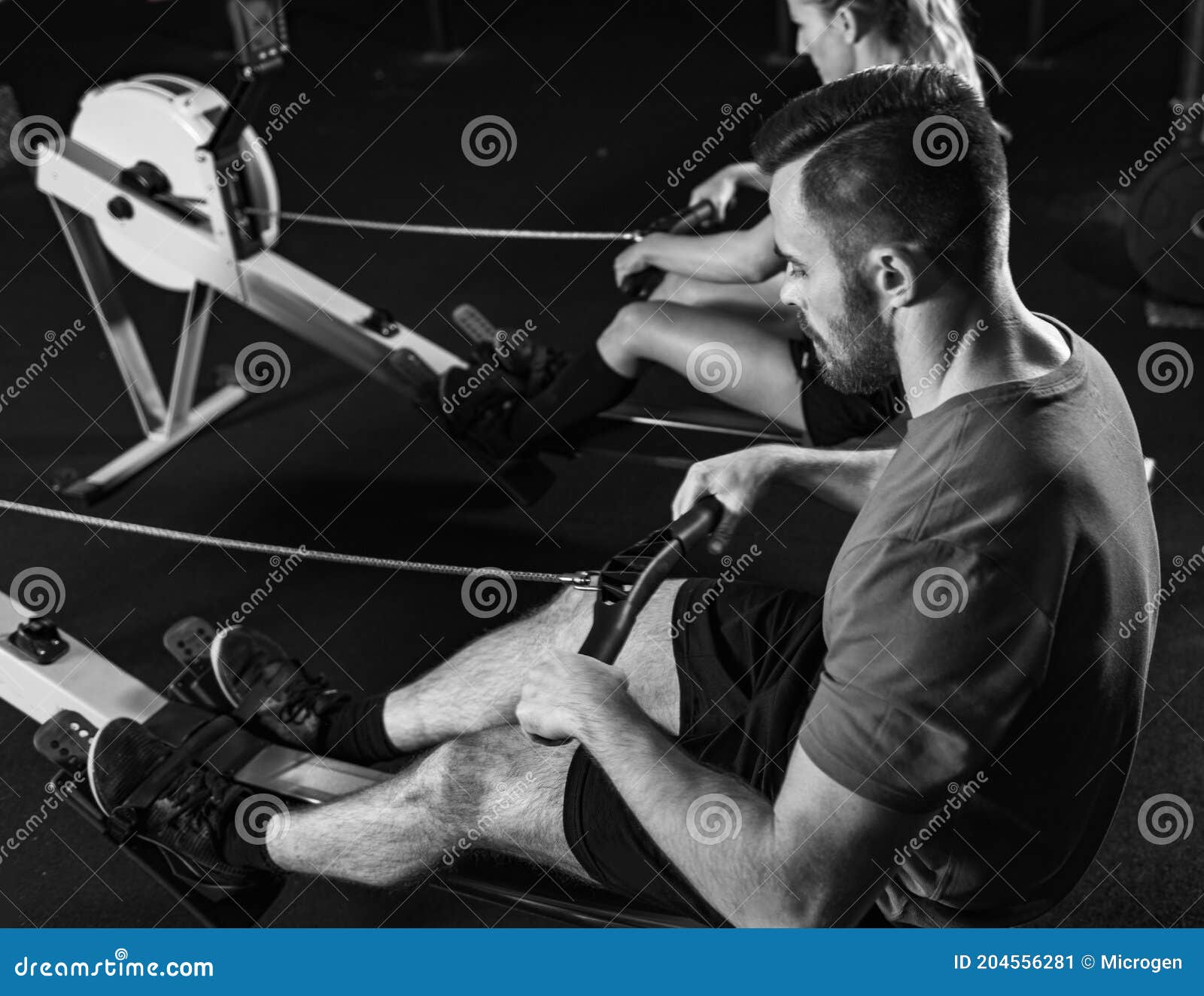 Cross Training. Rowing Machine Exercising Stock Image Image of