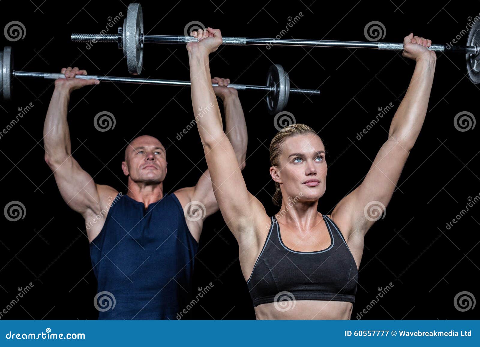 Crossfit De Levage D'homme Et De Femme Image stock - Image du bras, demi:  60557777