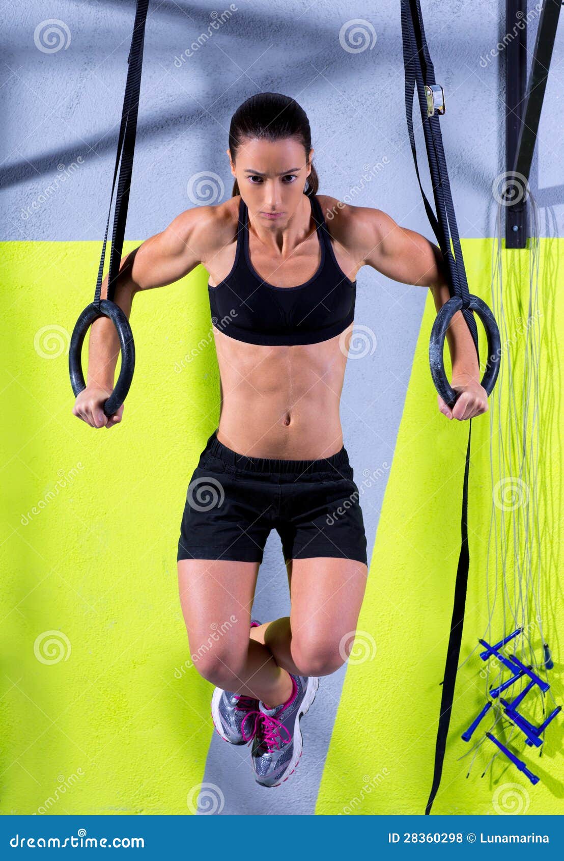 crossfit dip ring woman workout at gym dipping