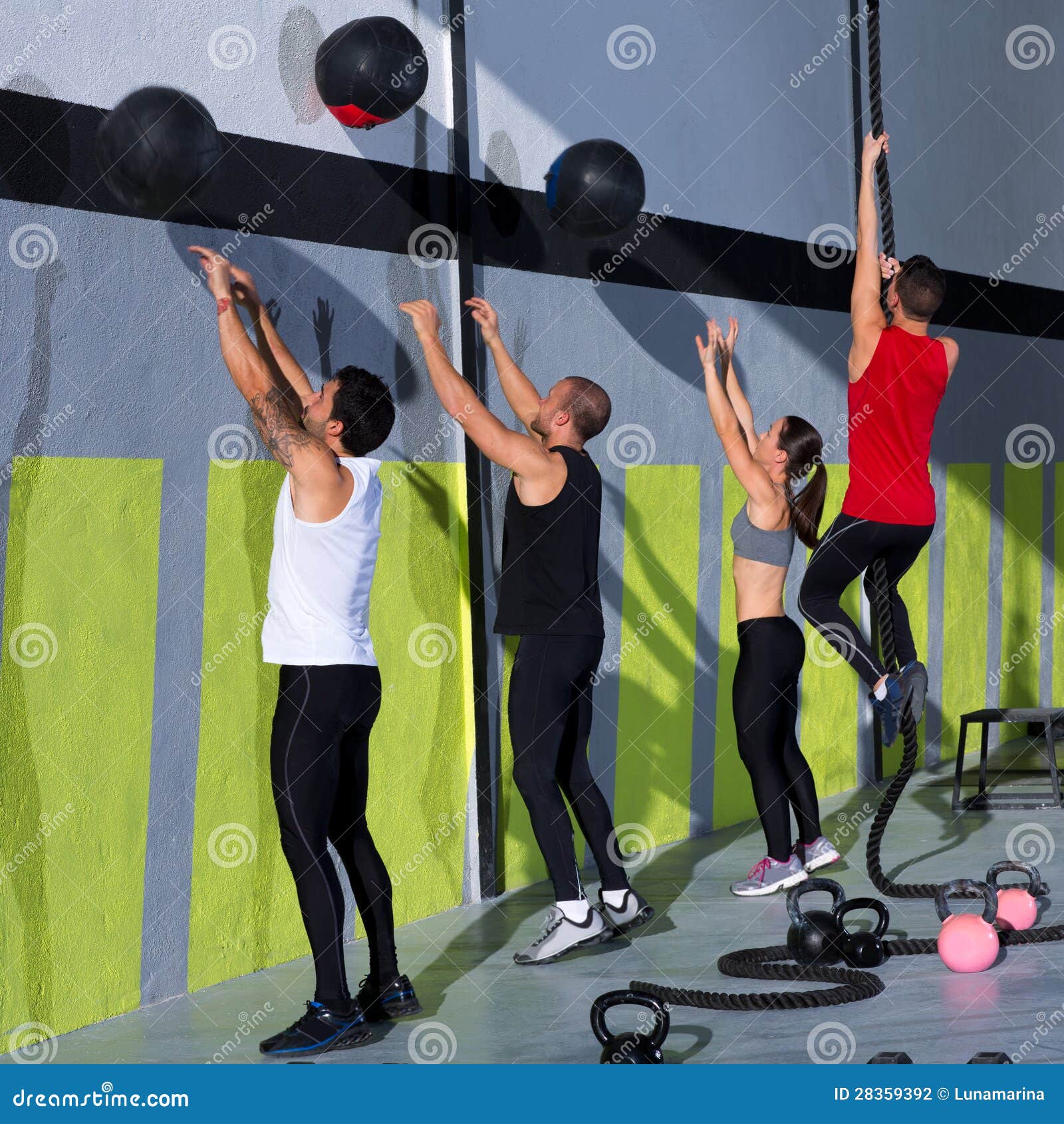 Crossfit Workout People Group with Wall Balls and Rope Stock Photo Image of dumbbell, healthy